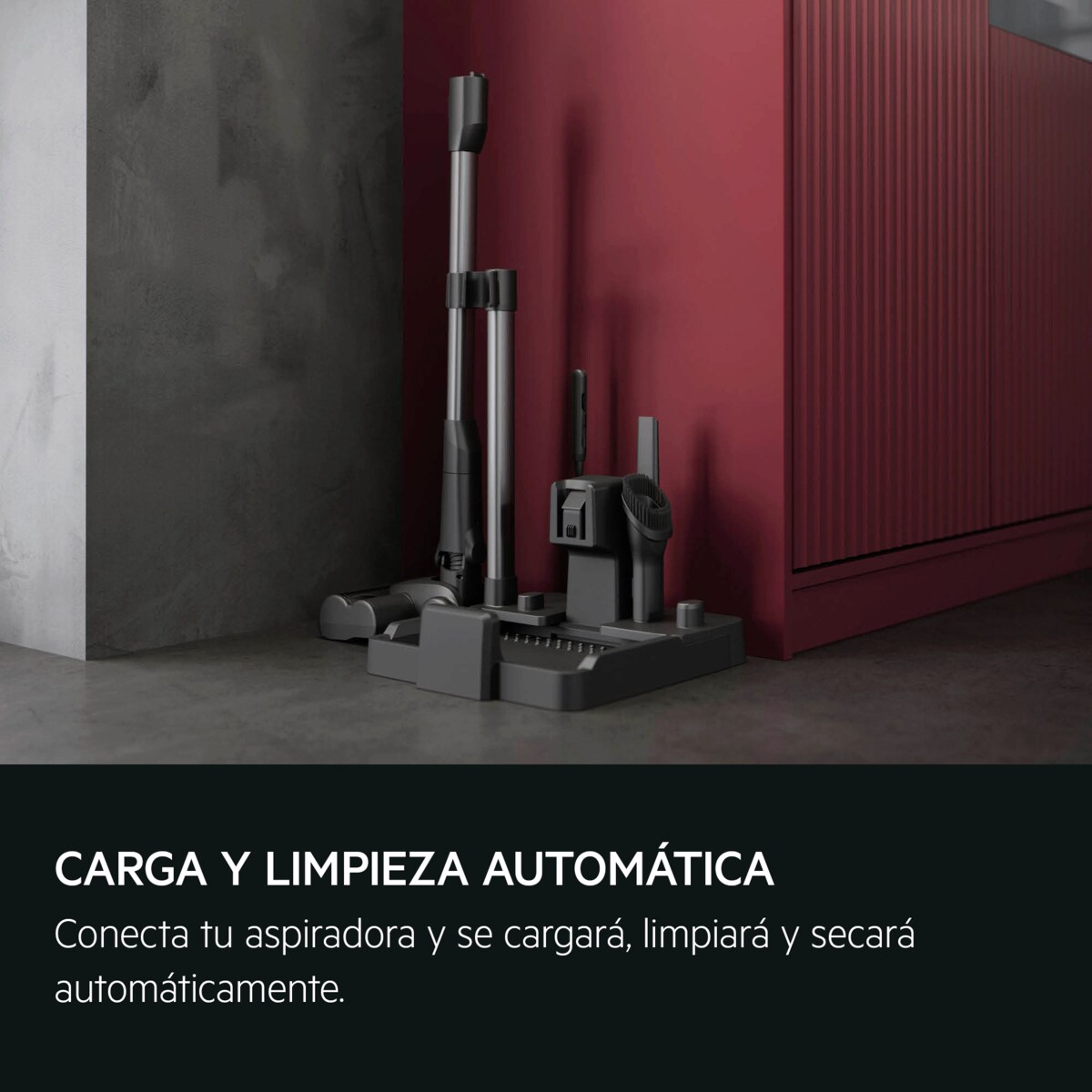 Un supporto per aspirapolvere con accessori davanti a un muro rosso.
