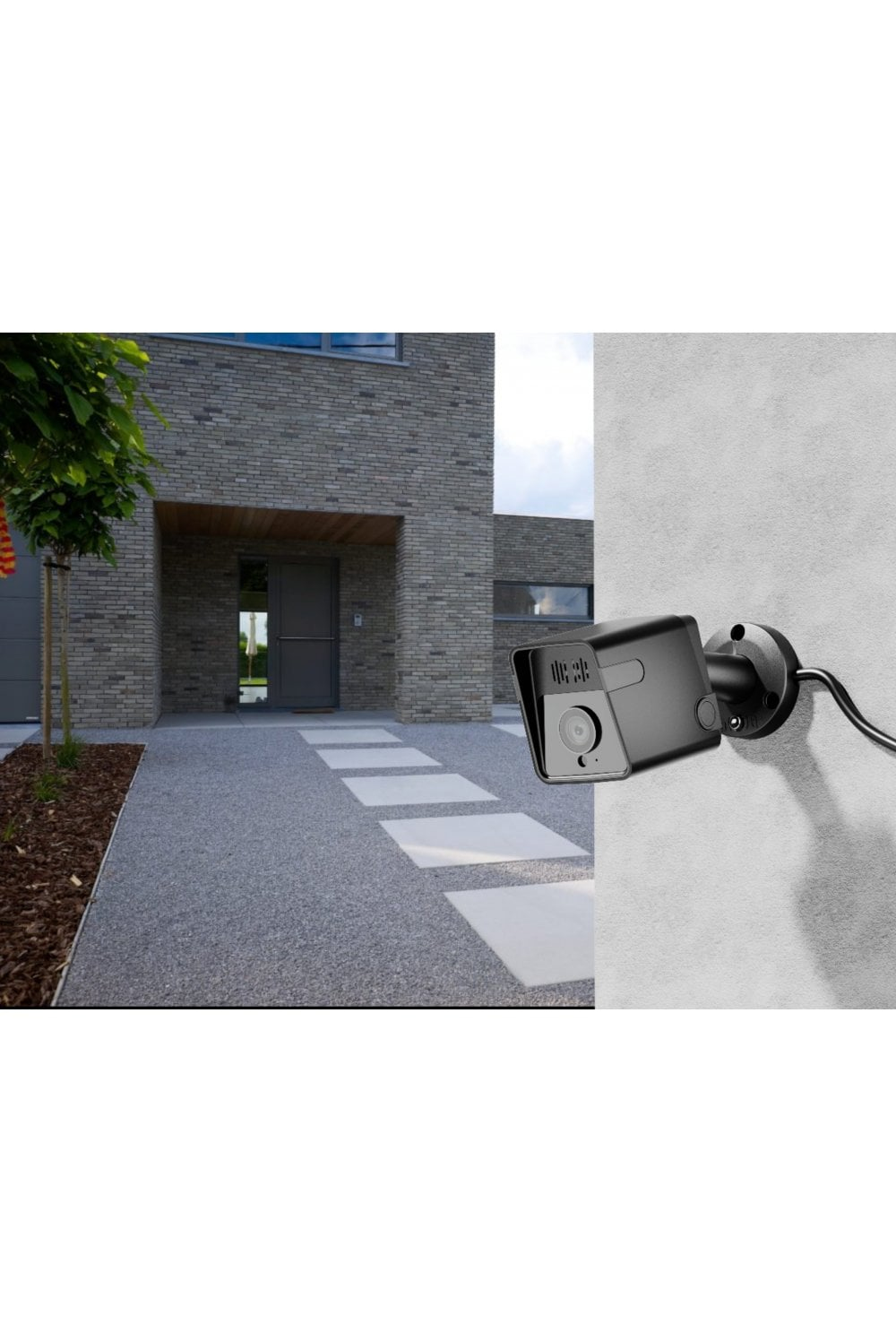 Una telecamera di sicurezza è montata su un muro, con una casa moderna sullo sfondo.