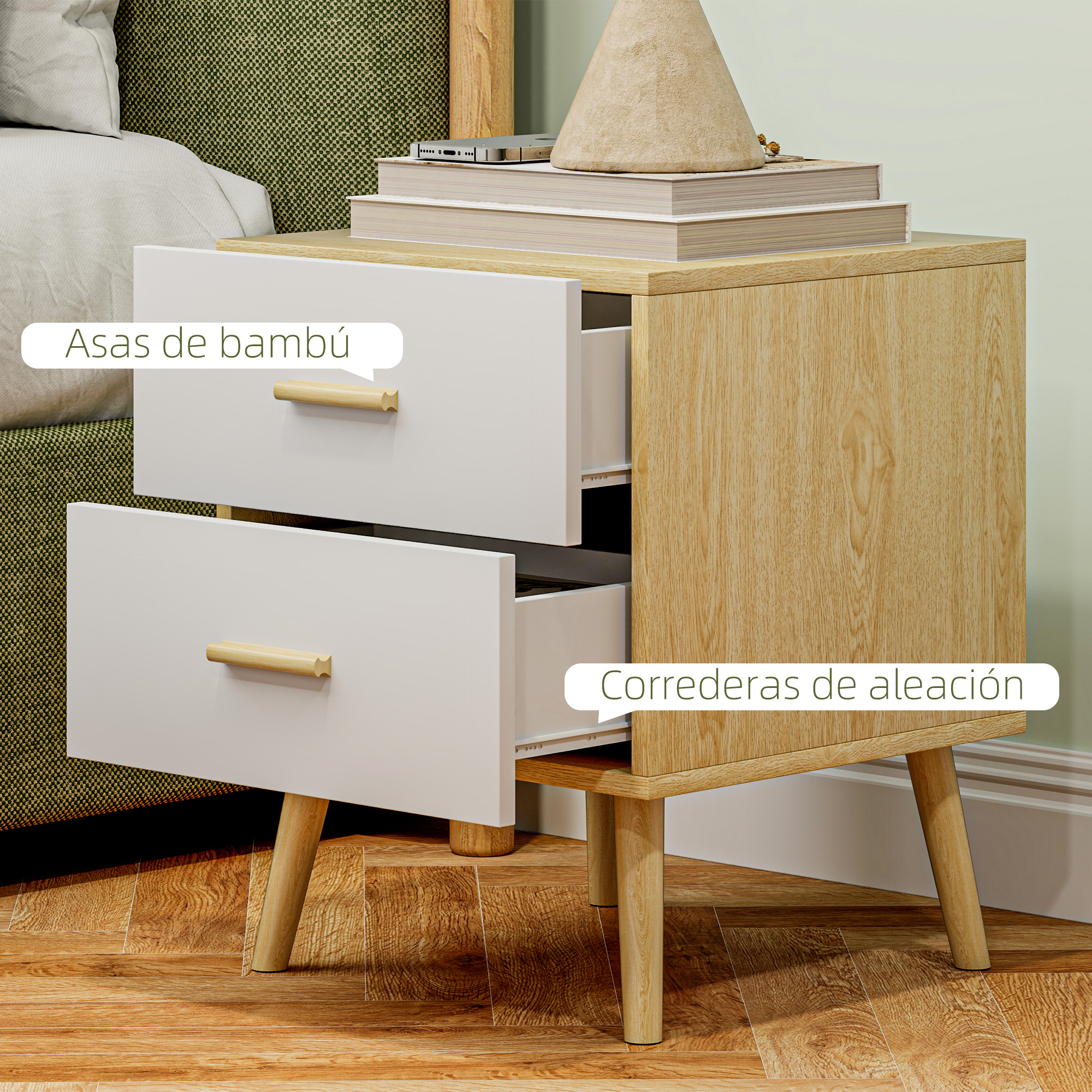 Mesita de noche con cajones blancos, patas de madera, tiradores de bambú.