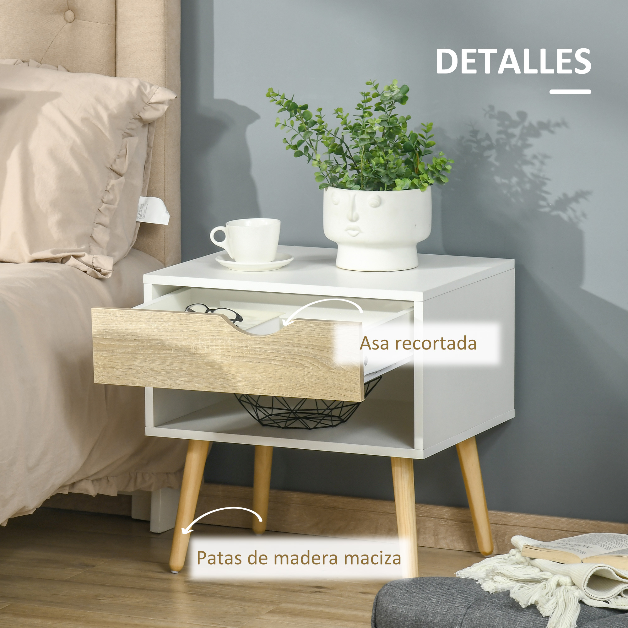 Un tocador con cajón, estante, maceta y taza. Acabado blanco, patas de madera.