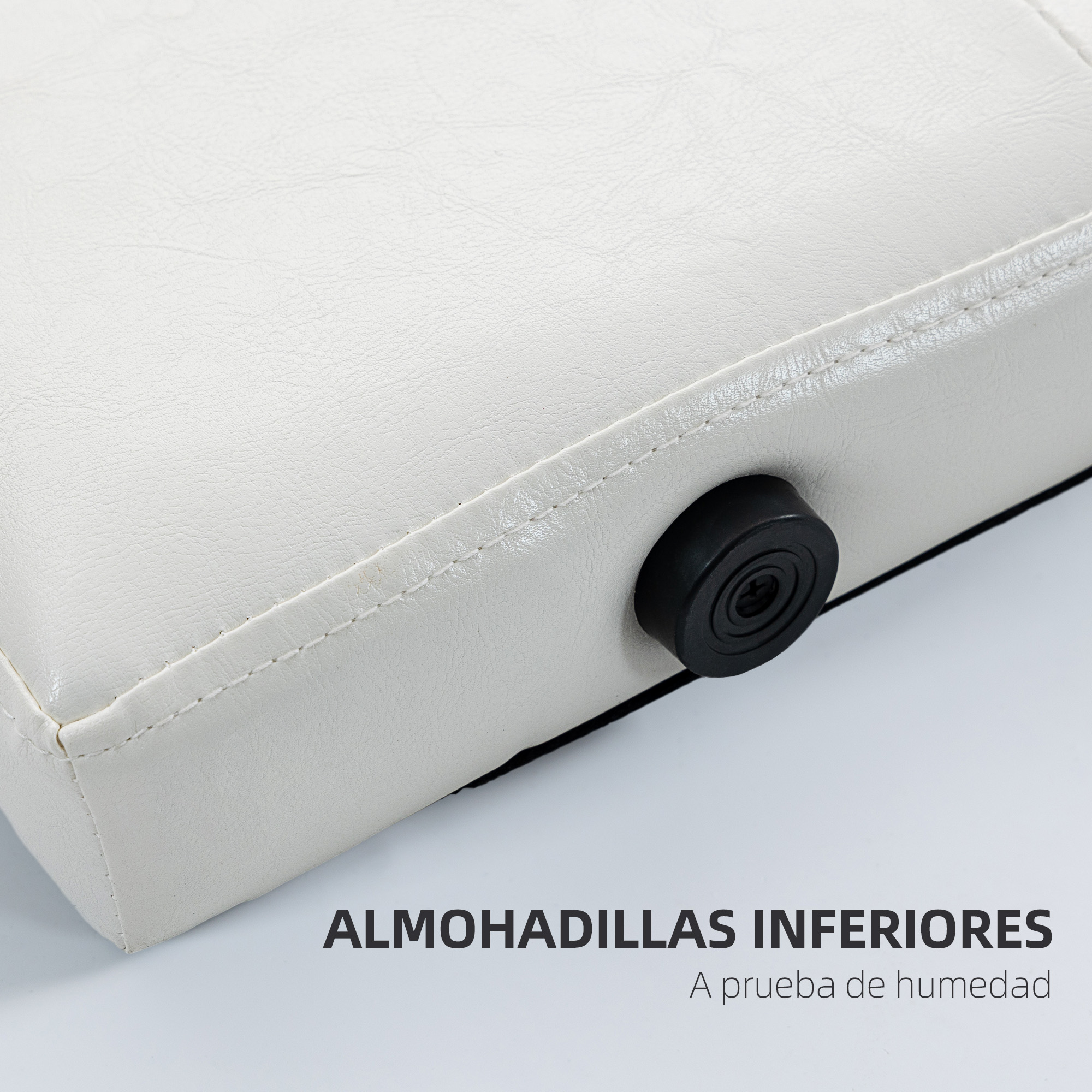Un cojín blanco con un pie de goma negro a la derecha.