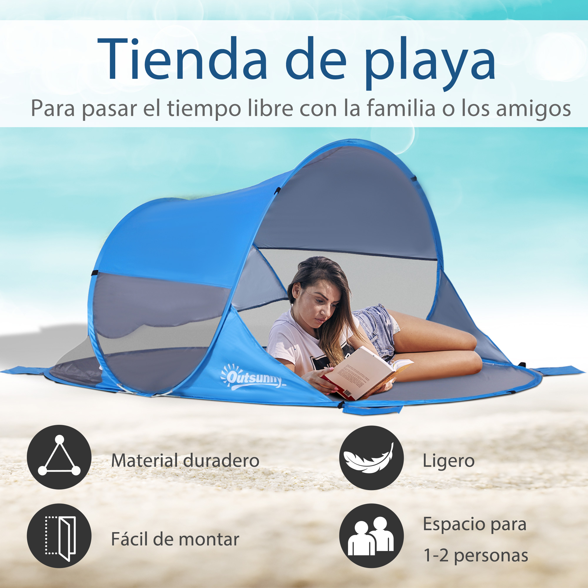 Una mujer lee en una tienda de playa azul sobre la arena.