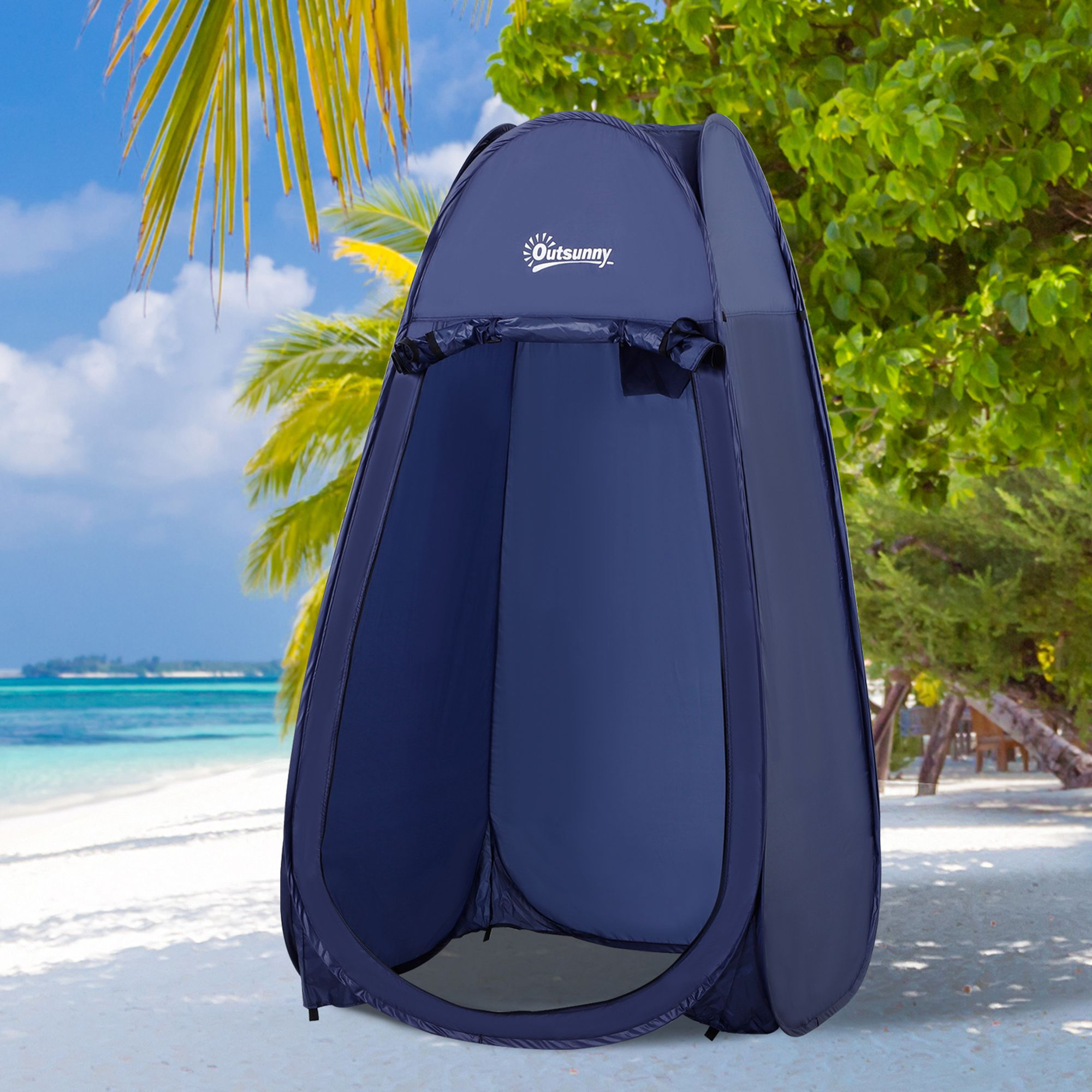 Una carpa plegable azul oscuro en una playa con palmeras y el océano de fondo.