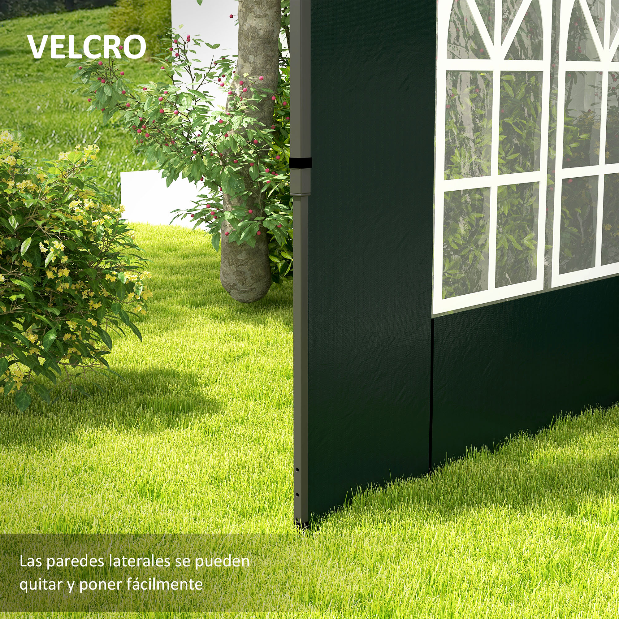 Una carpa verde con ventanas se alza sobre césped junto a un árbol.
