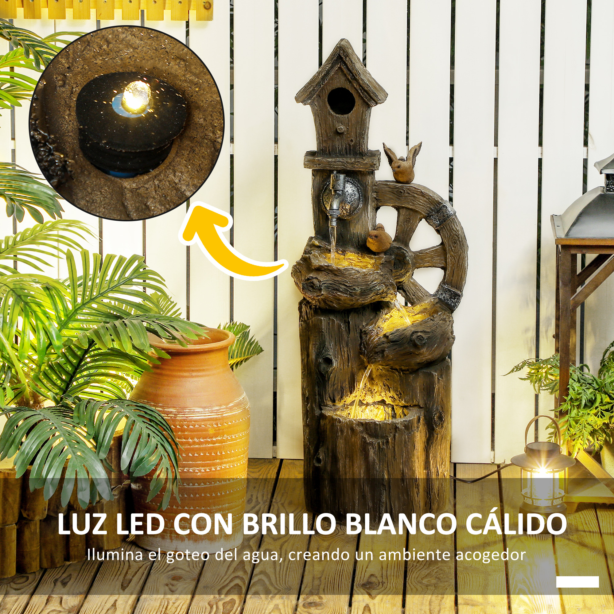 Una fuente decorativa con pajarera, rueda de agua e iluminación LED.