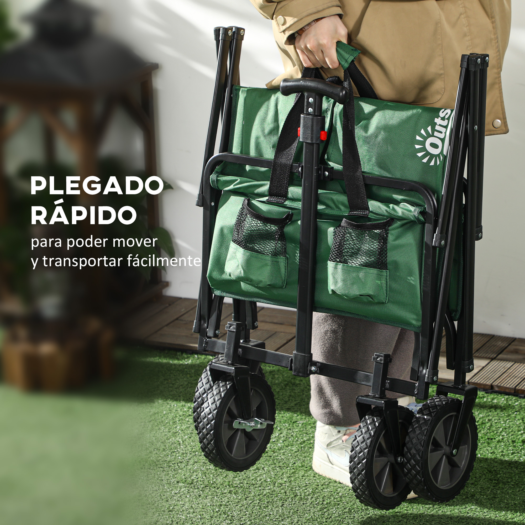 Una carretilla verde plegable para exteriores con ruedas y asas negras.