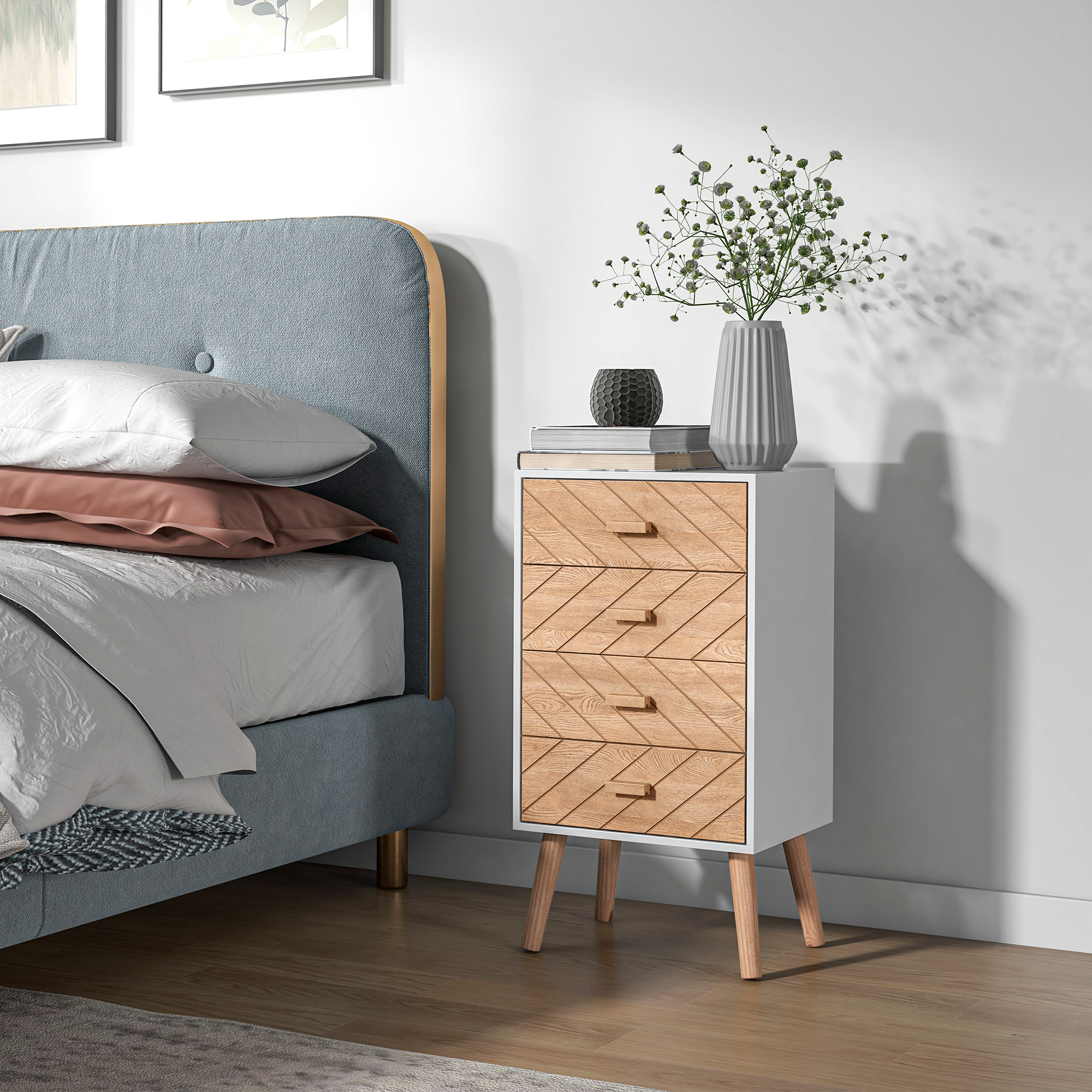 Una mesita de noche con cajones de madera junto a una cama con cabecero azul.