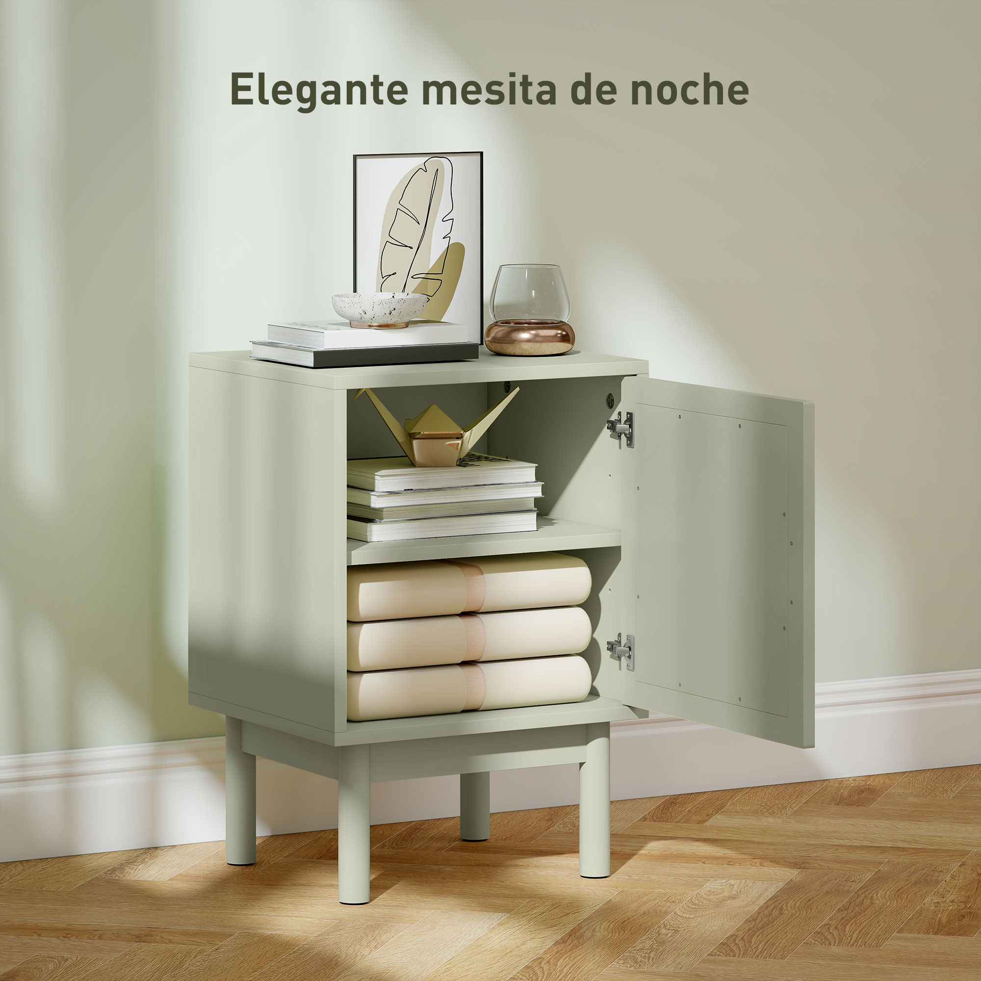 Mesita de noche verde claro con puerta abierta, libros y decoración.