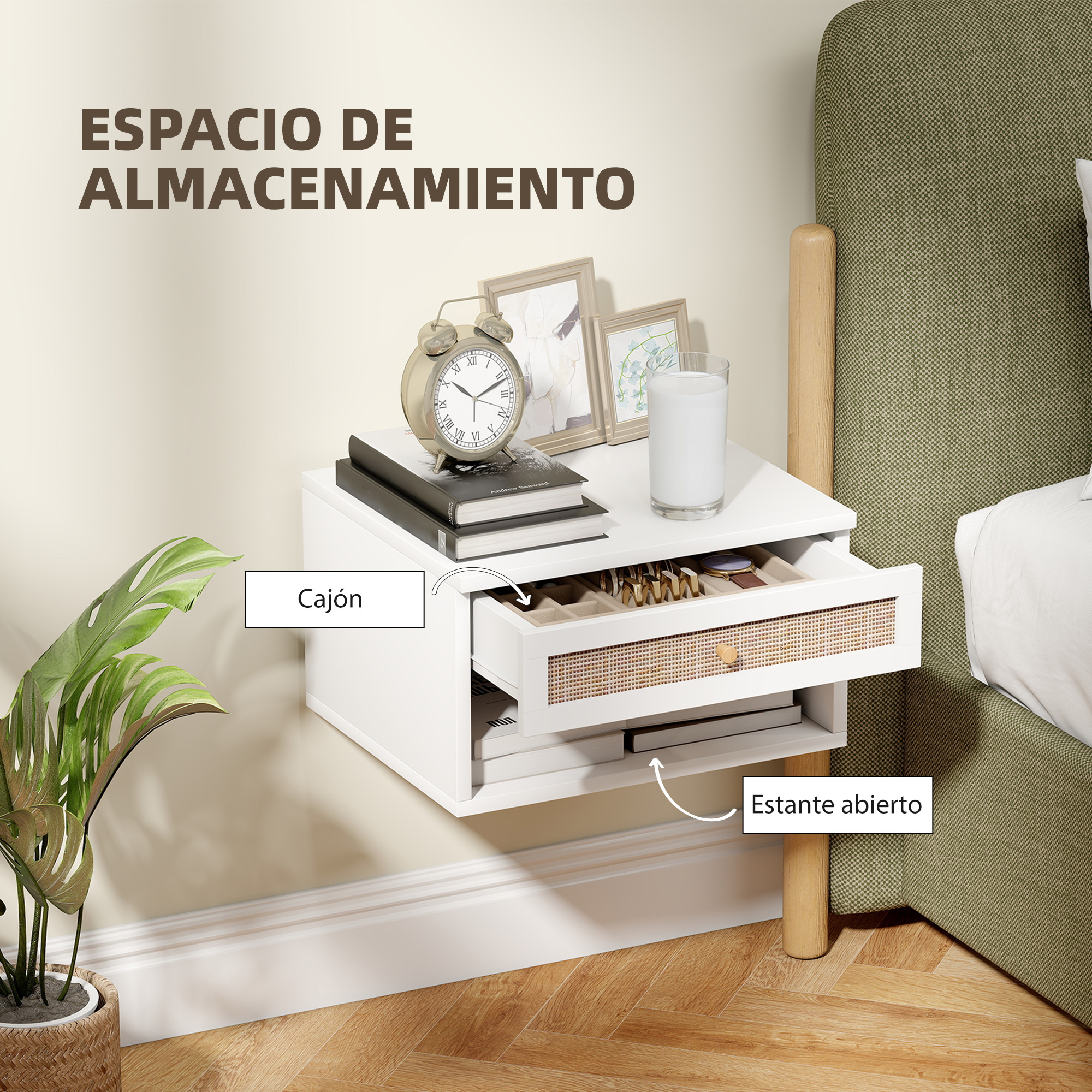 Una mesita de noche blanca con cajón abierto, reloj, libros y planta.