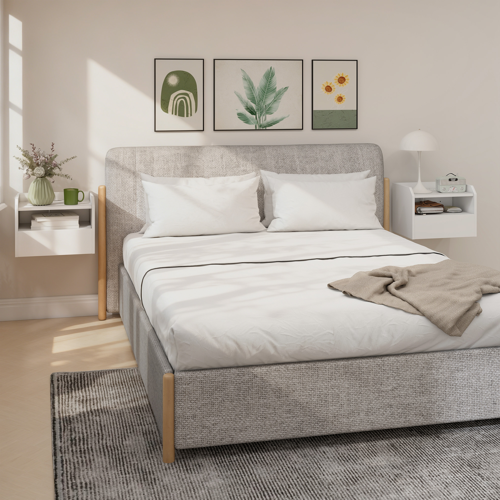 Un dormitorio con cama gris, almohadas blancas y manta.