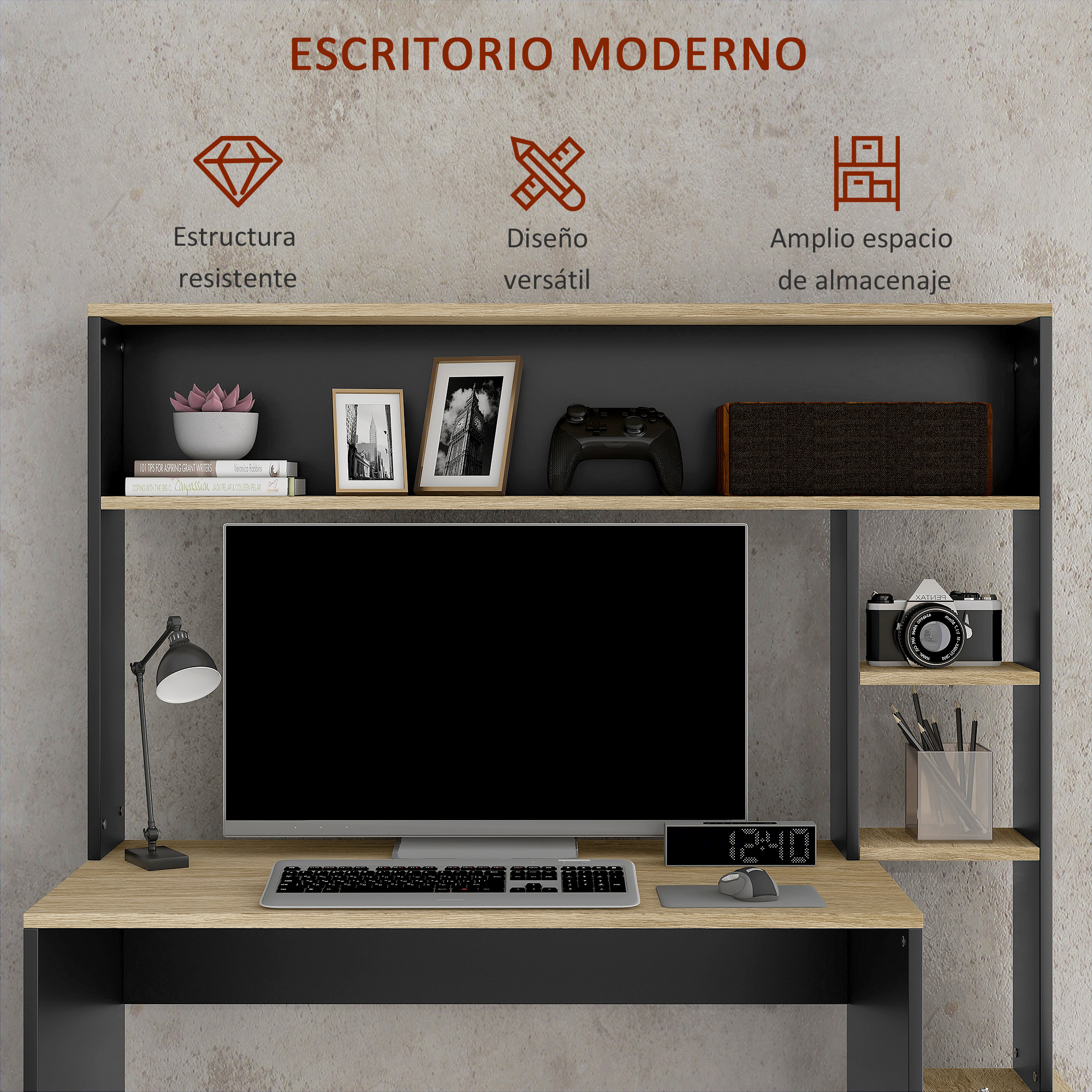 Escritorio moderno con monitor, teclado, ratón, lámpara, cámara y plantas.
