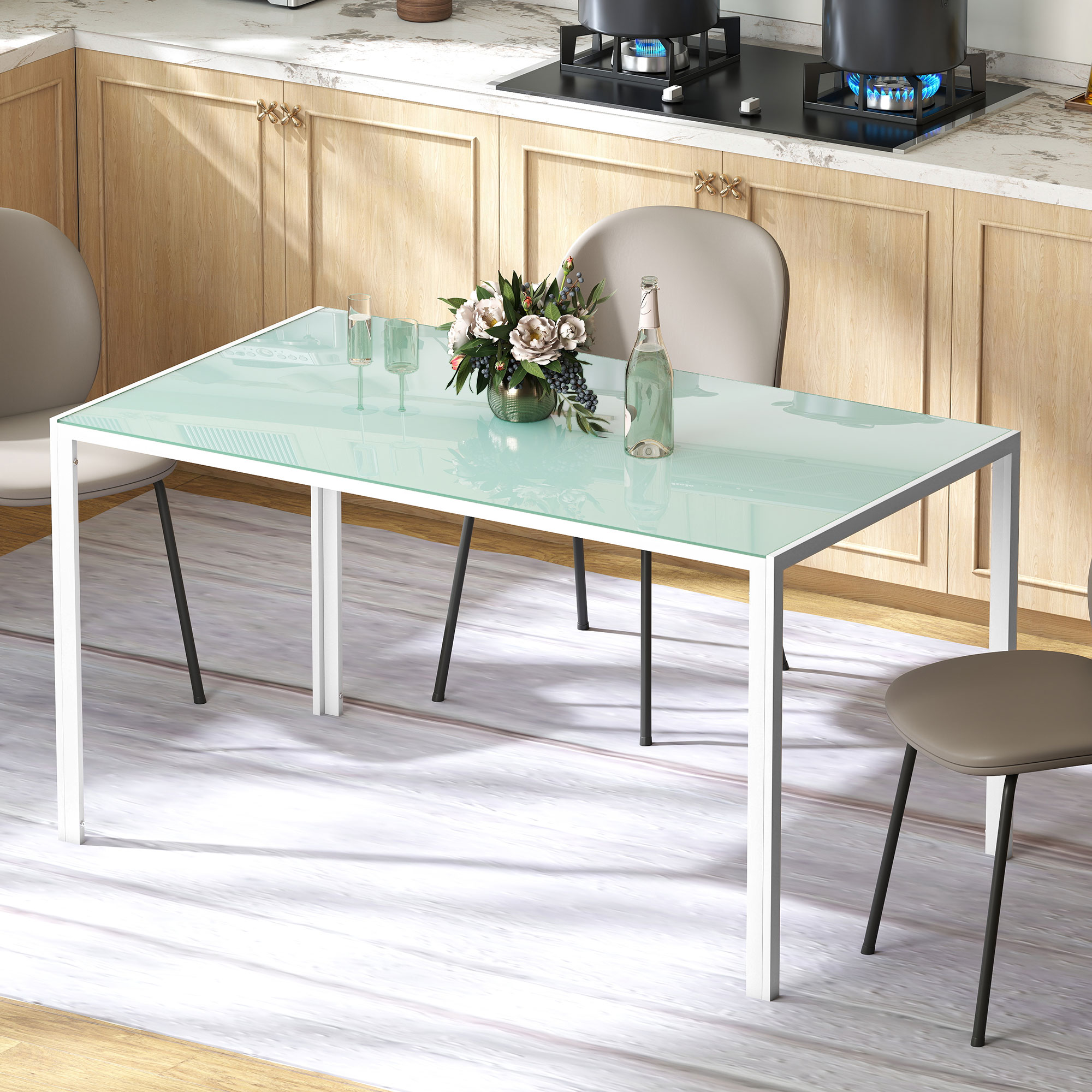 Una cocina moderna con mesa de cristal, sillas y estufa con llama azul.