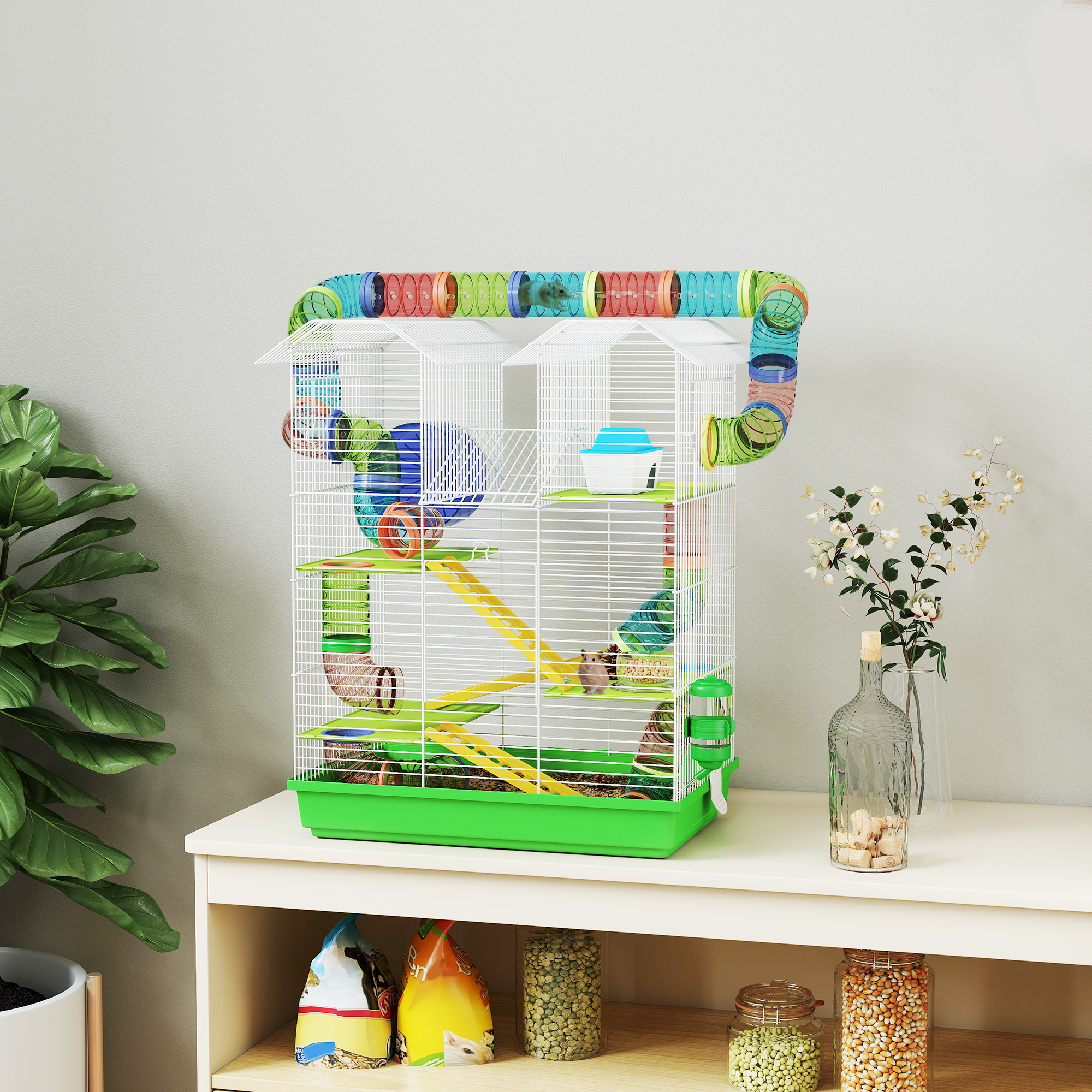 Una jaula para hámster con un hámster, tubos y accesorios en un estante.