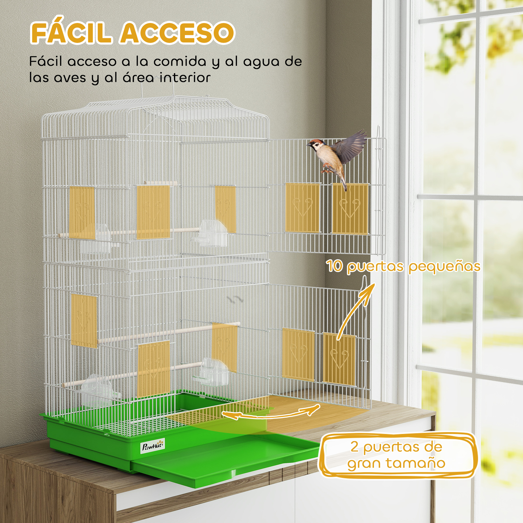 Una jaula blanca para pájaros con cajón verde sobre mueble de madera. Un pájaro vuela.