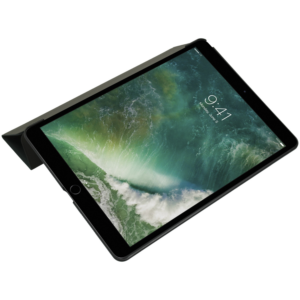 A black tablet with a wave wallpaper stands on a white background.