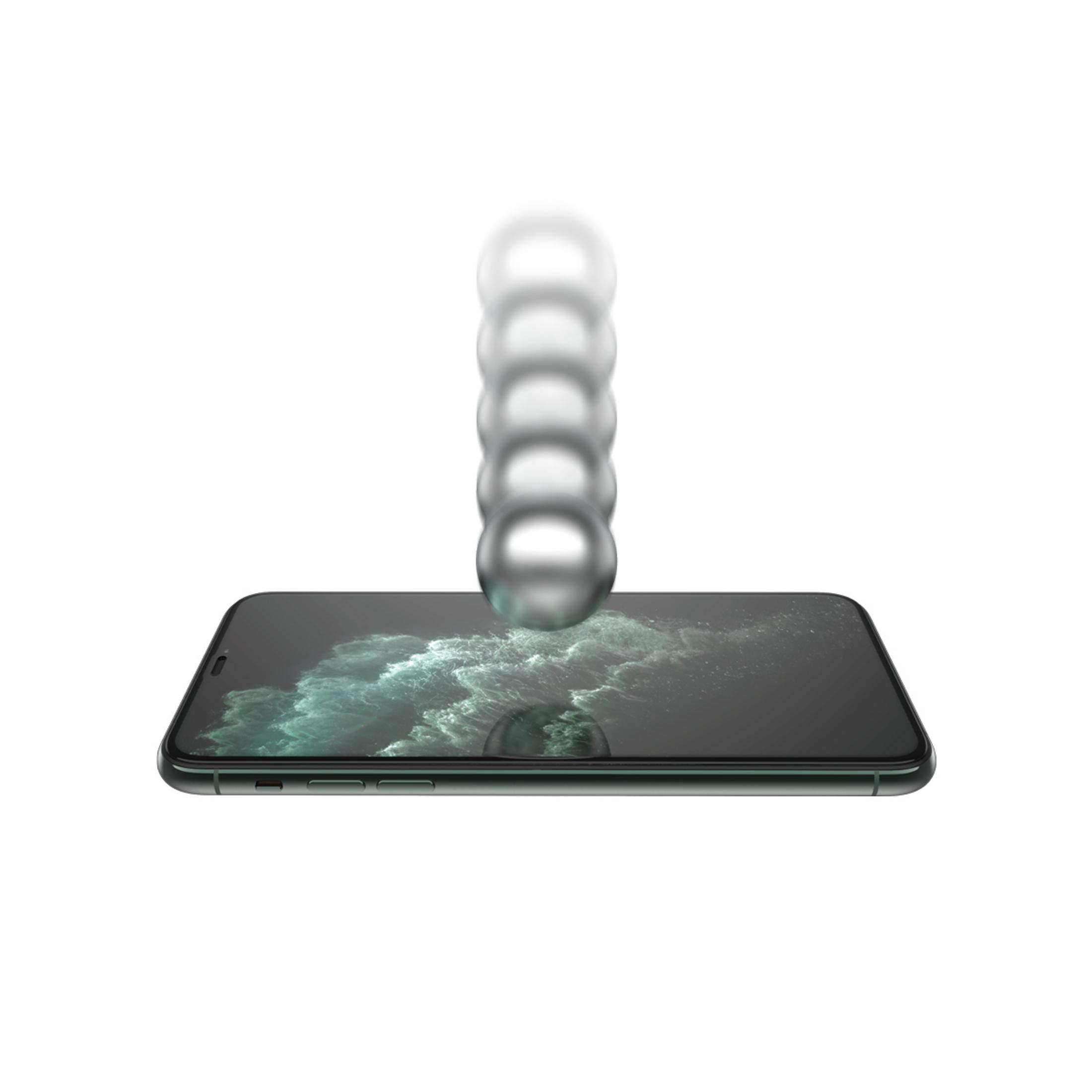 Zilveren ballen bewegen over een smartphone.