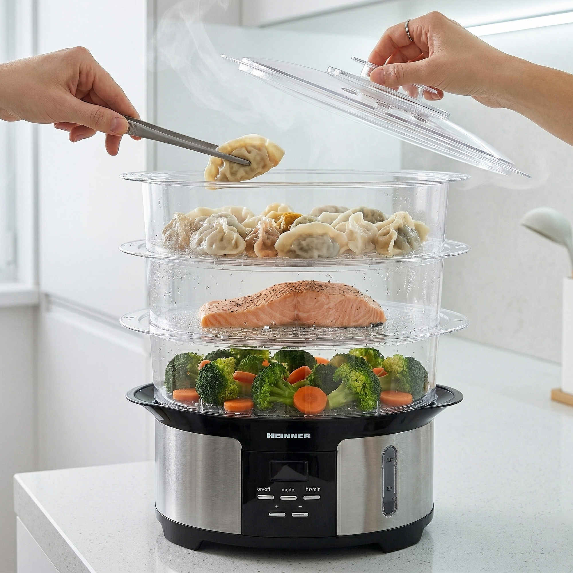 Steamer with broccoli, salmon, and dumplings.