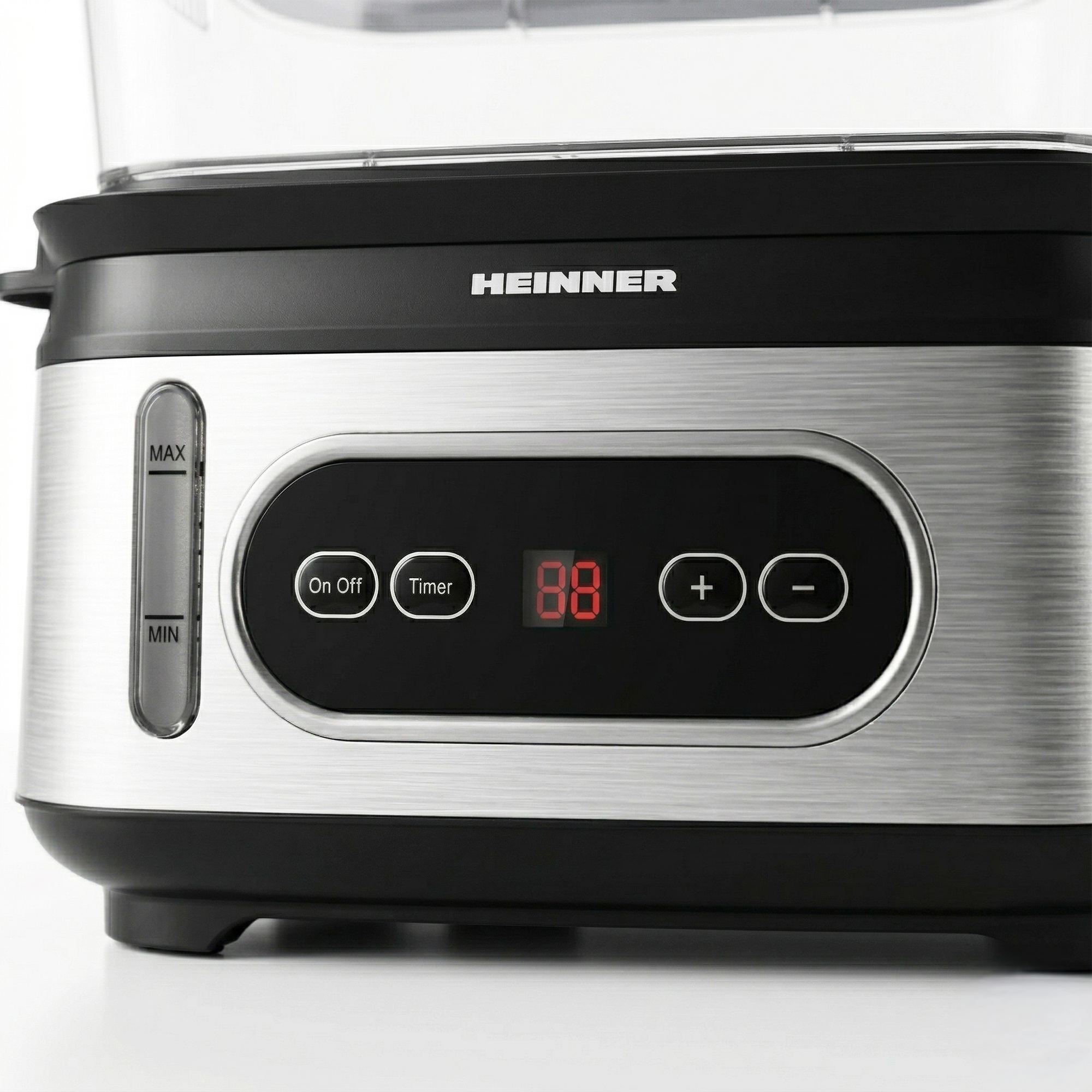 Close-up of a food steamer with control panel and digital display.