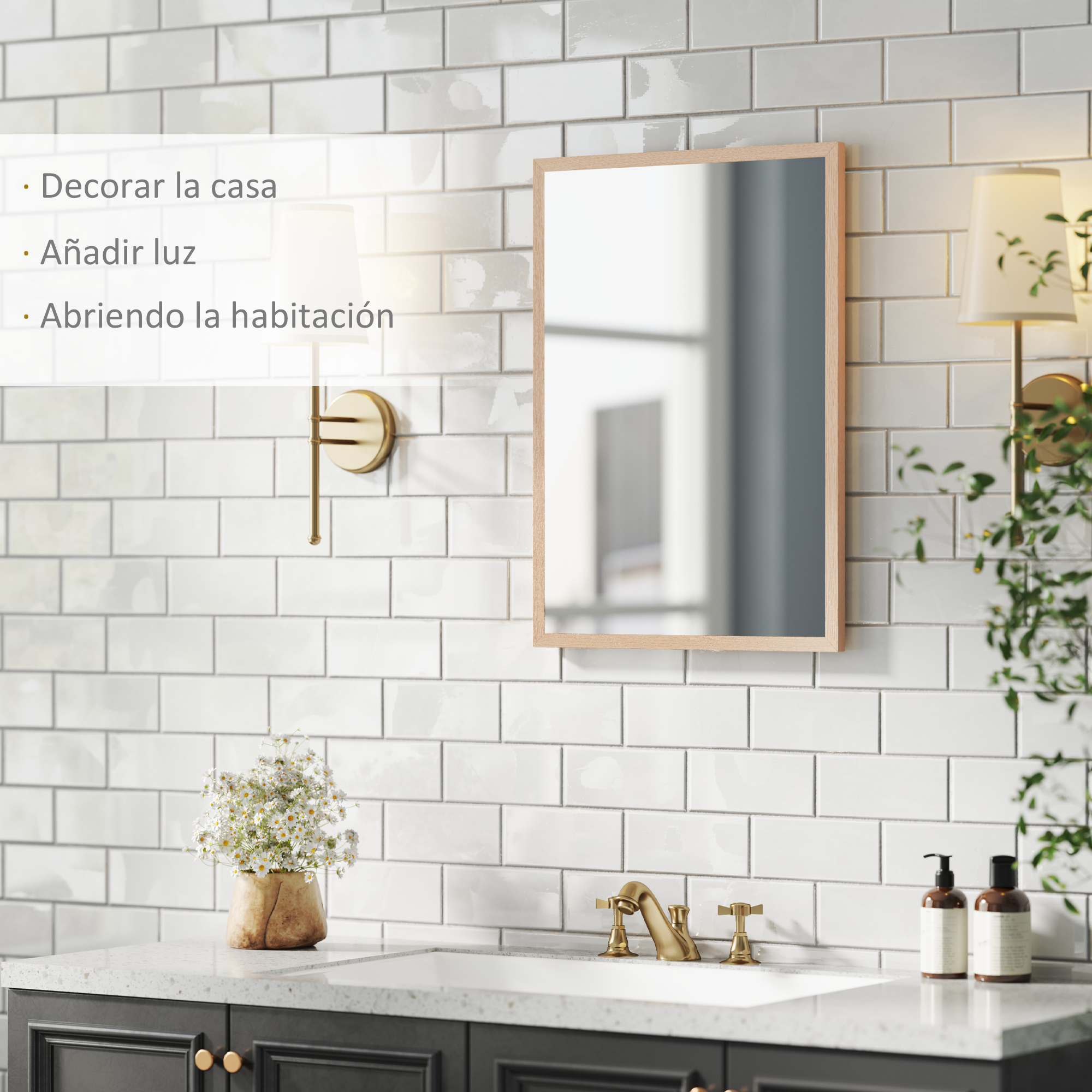 Un baño con azulejos blancos tipo metro, espejo y grifería dorada.