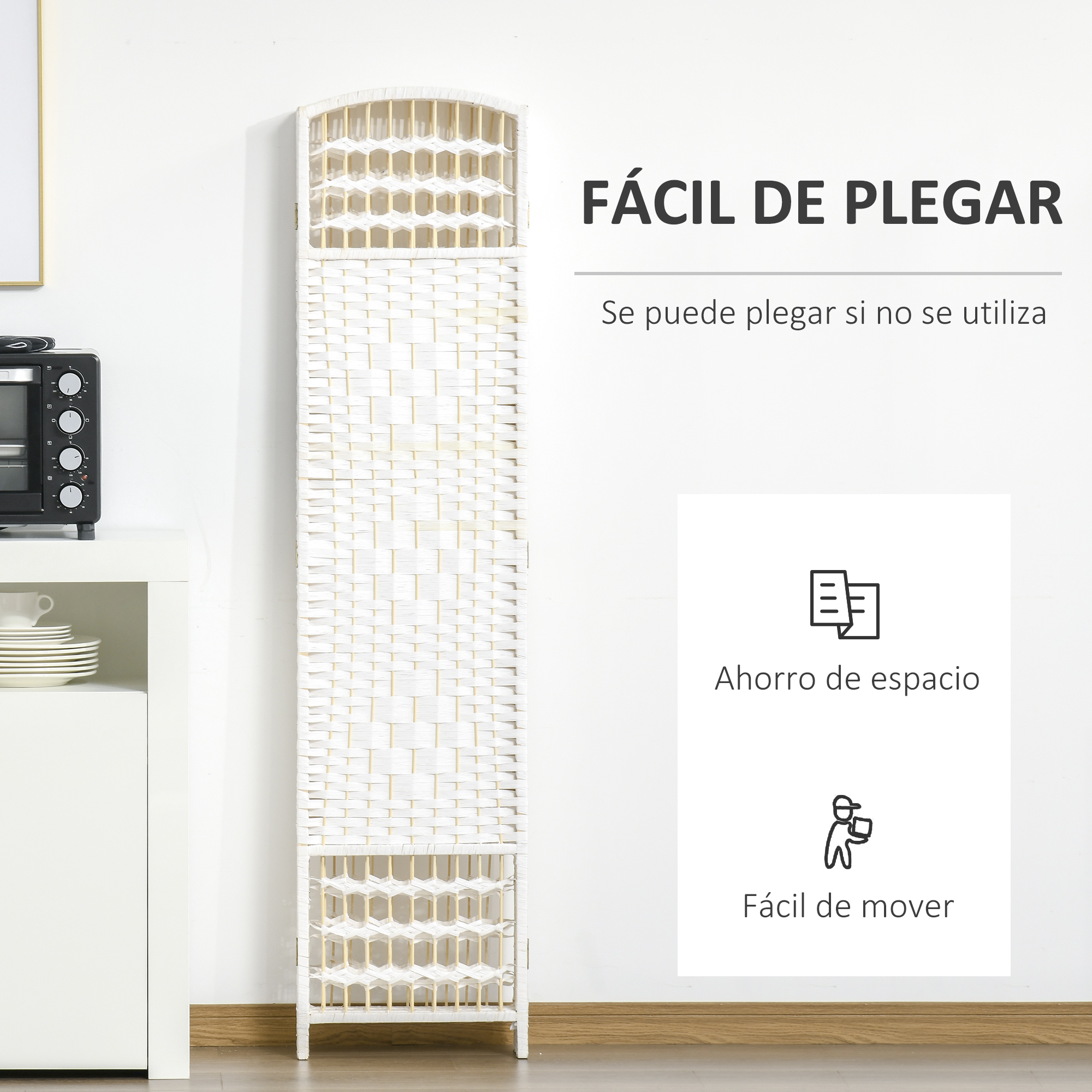 Un separador de ambientes blanco junto a un armario blanco con horno.