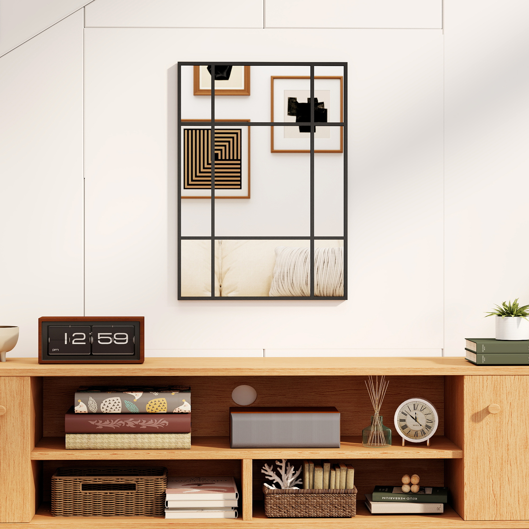 Un aparador de madera con espejo, relojes, libros y decoración.