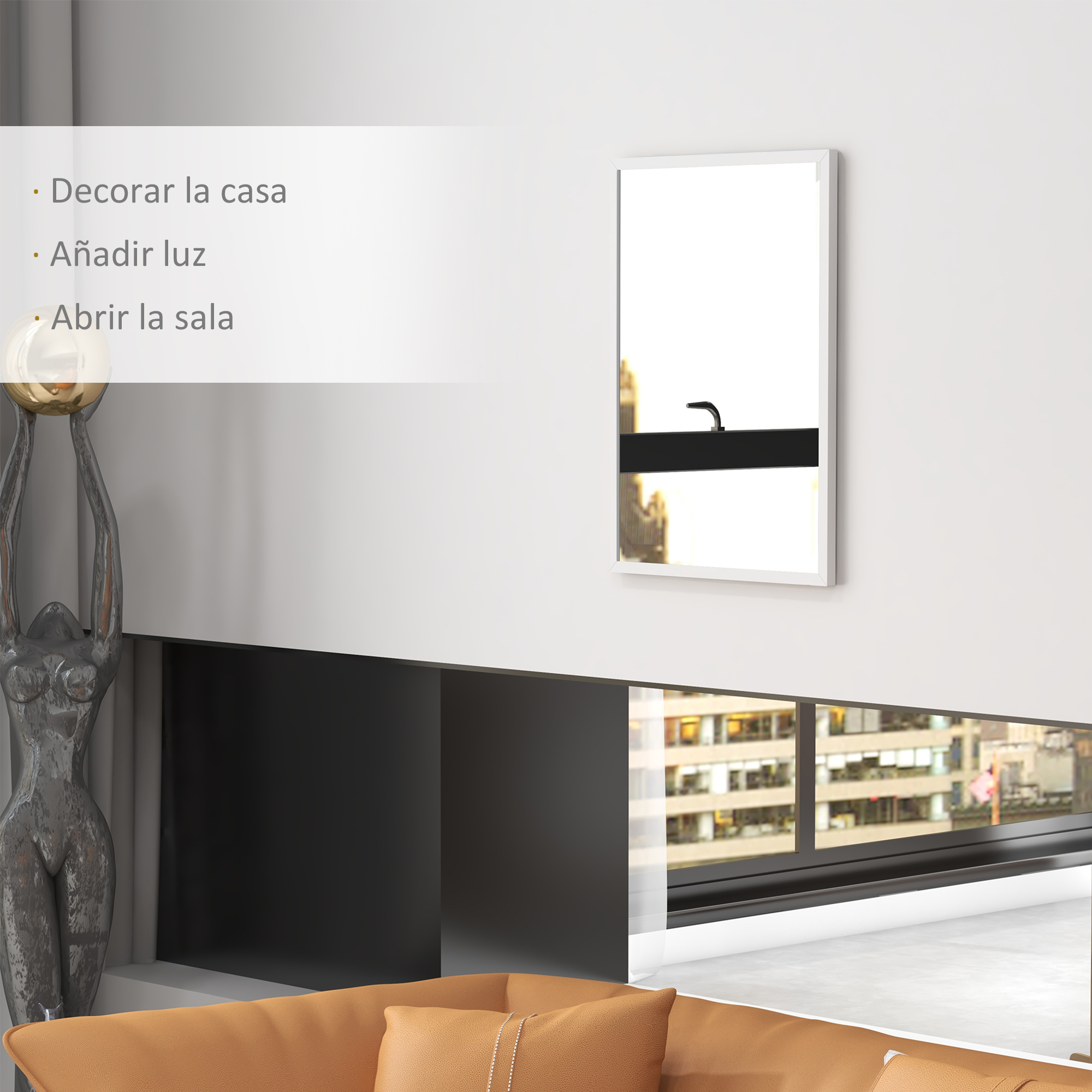 Un espejo decorativo cuelga en una pared blanca sobre un sofá marrón.