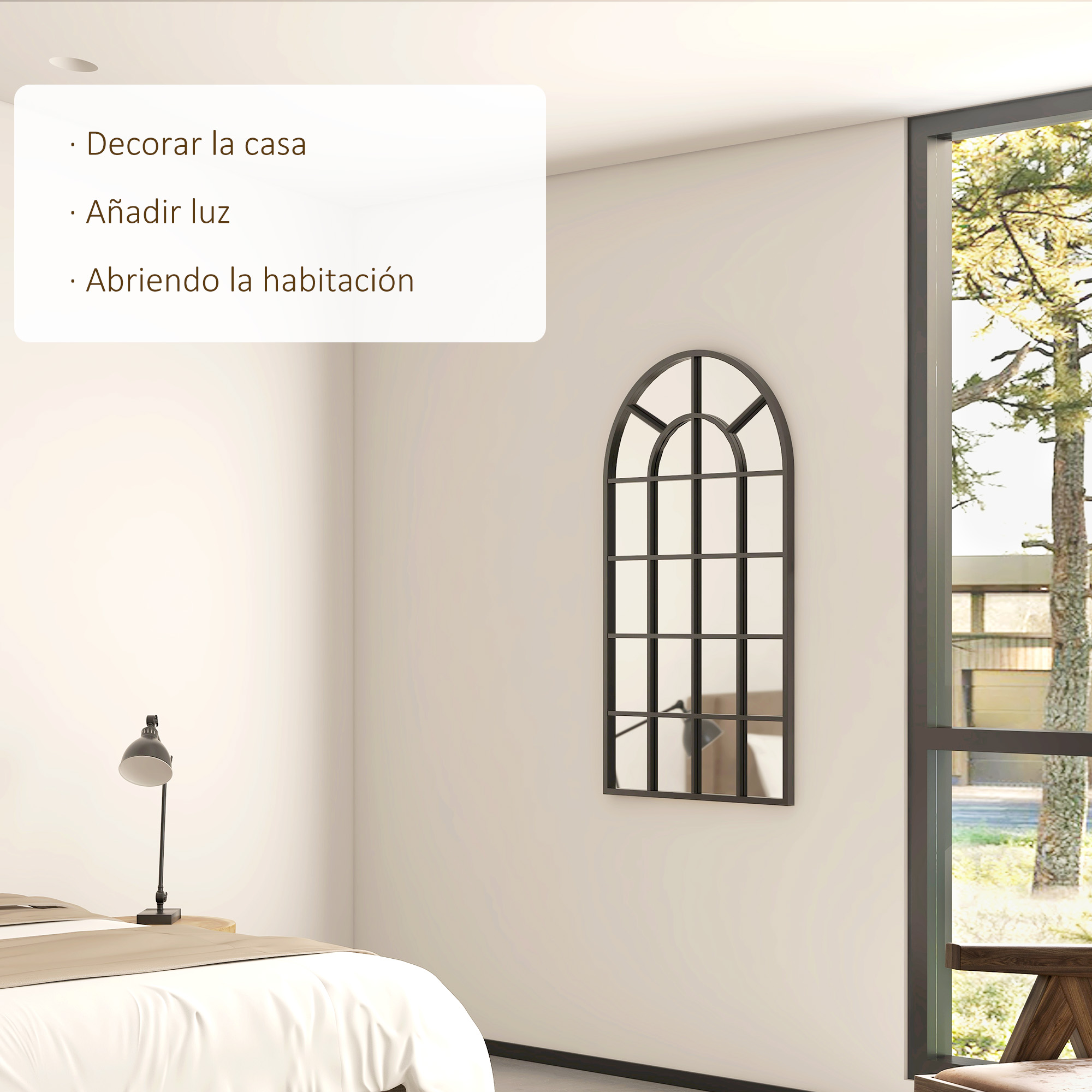 Un dormitorio con cama, espejo y ventana con vistas a árboles.