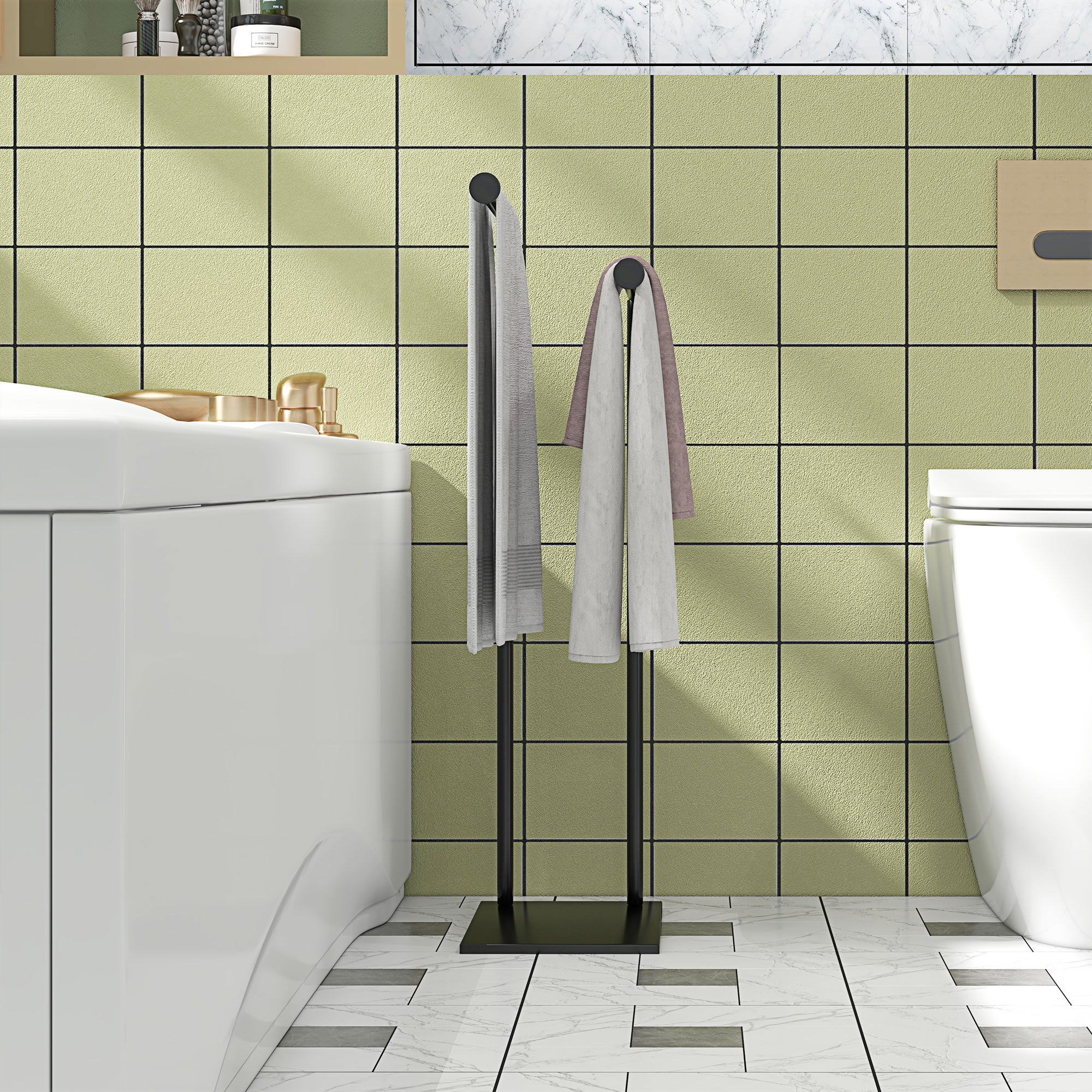 Un bidé blanco, un toallero con dos toallas y una pared de azulejos verde claro.