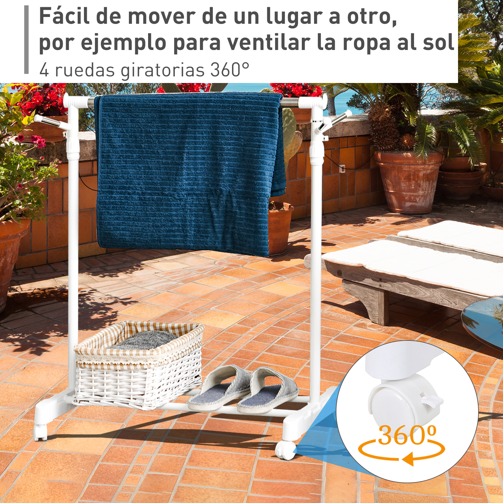 Un tendedero blanco con toalla azul, cesta y zapatos en un patio.