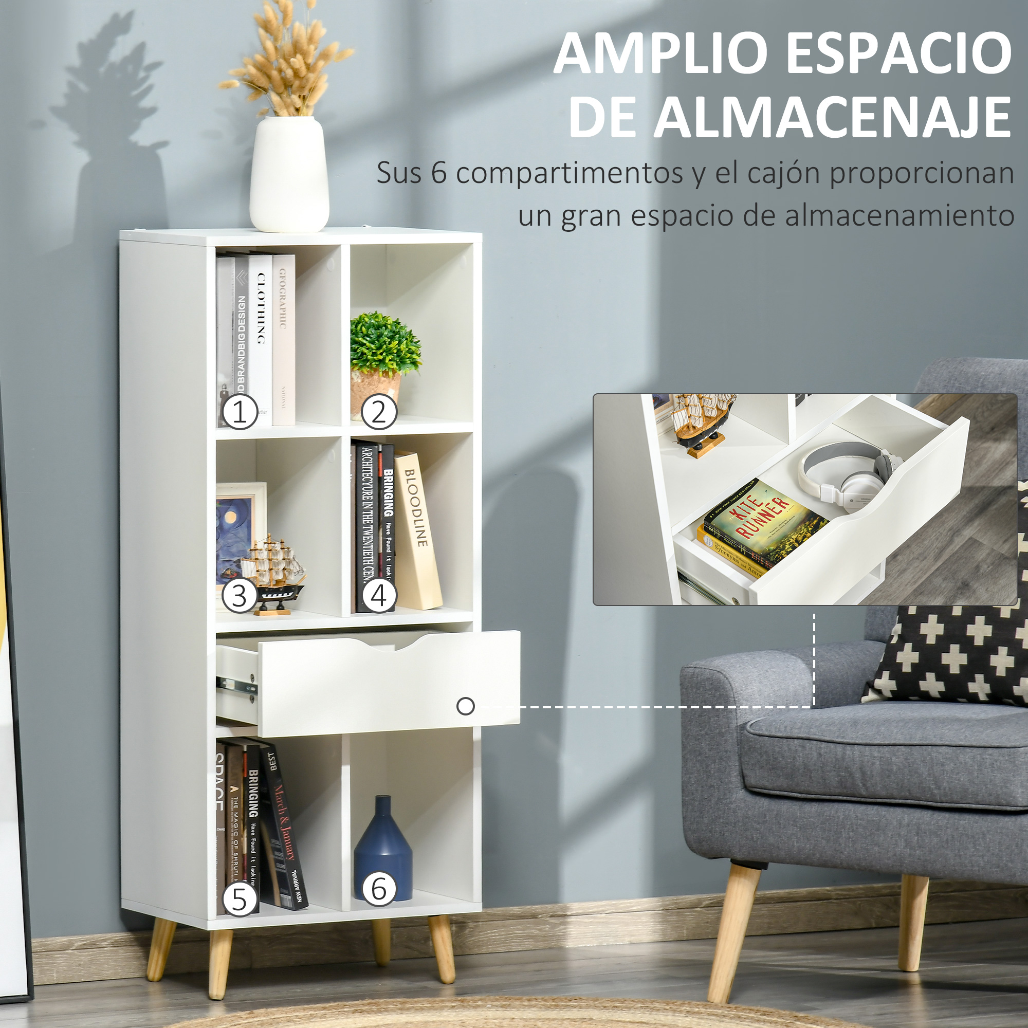 Una estantería blanca con estantes, libros, una planta, un barco y un jarrón.