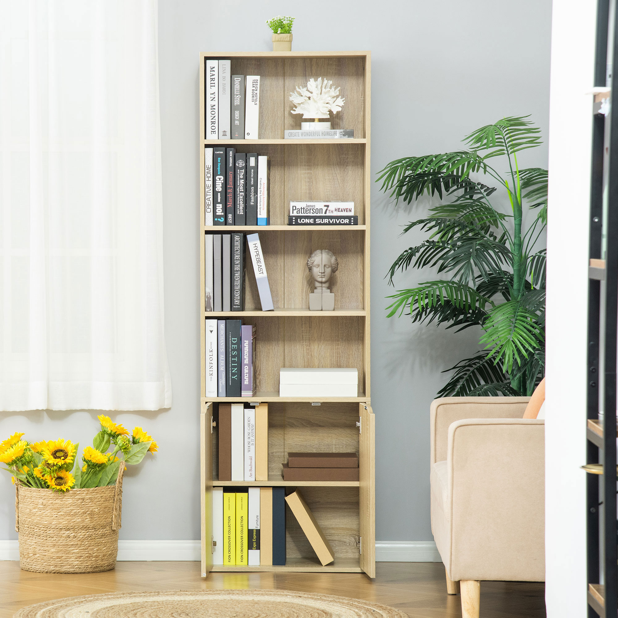 Estantería de madera clara con libros, girasoles y un sillón cerca.