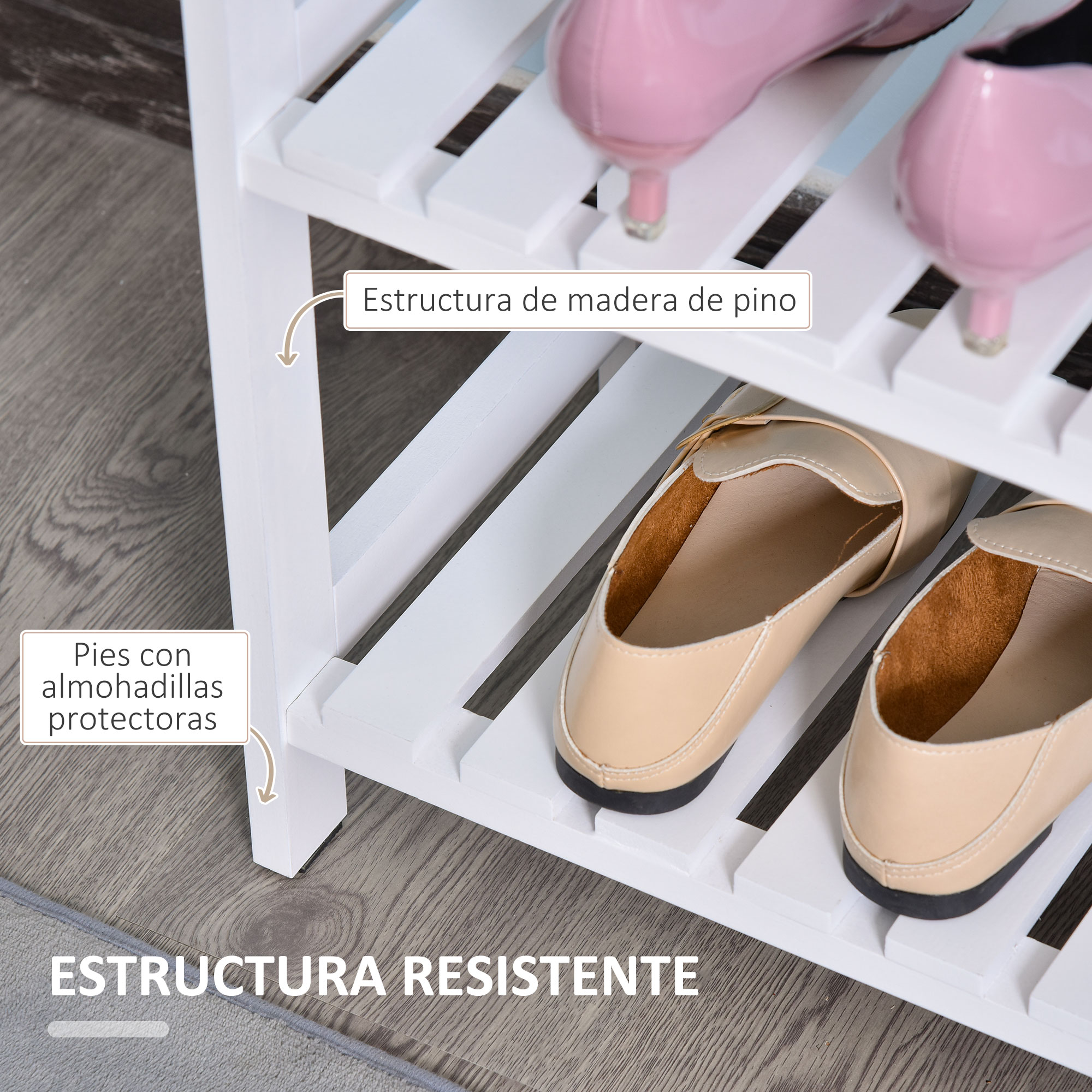 Zapatero blanco con tacones rosas y mocasines beige sobre suelo de madera.
