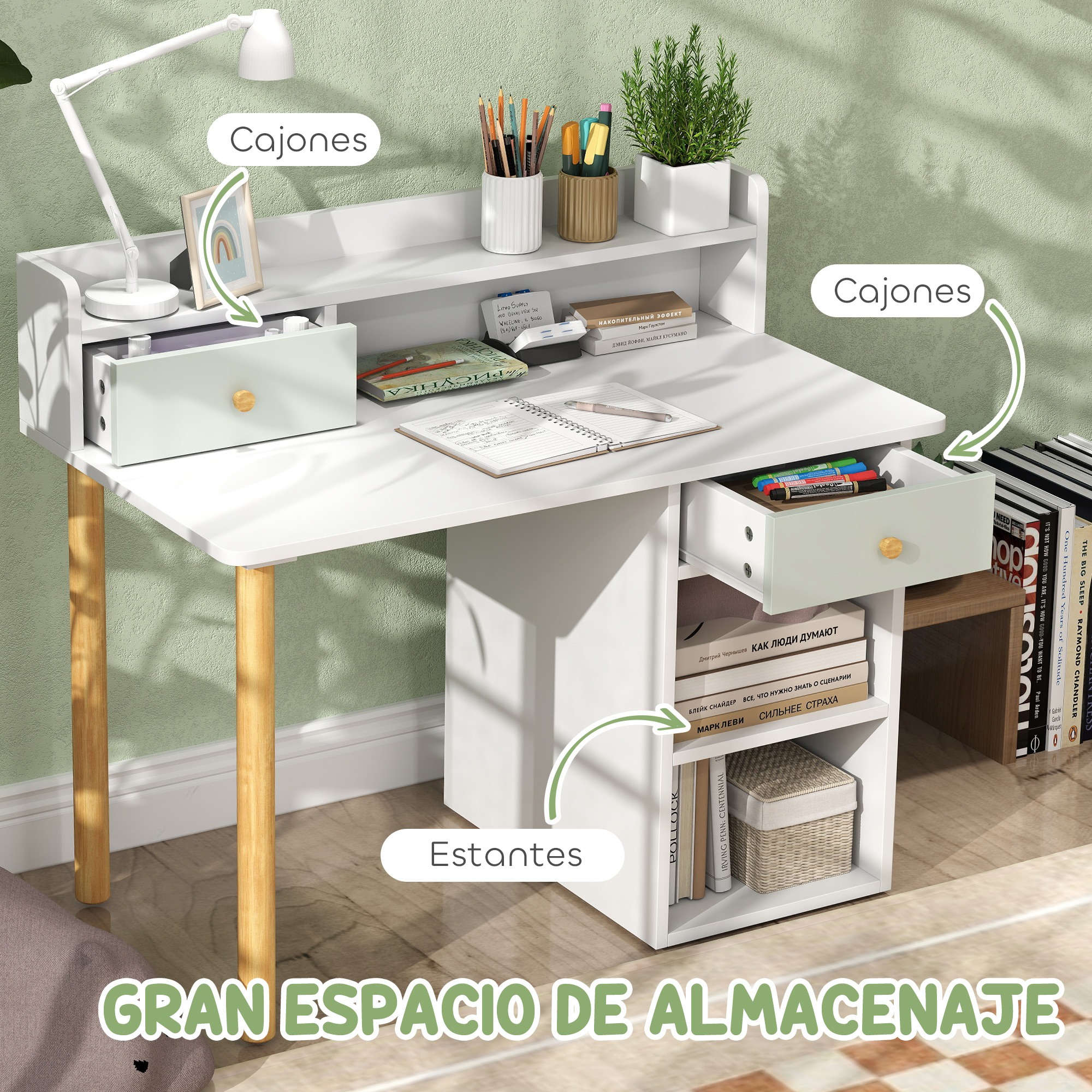 Un escritorio blanco con cajones, libros, una lámpara y una planta.
