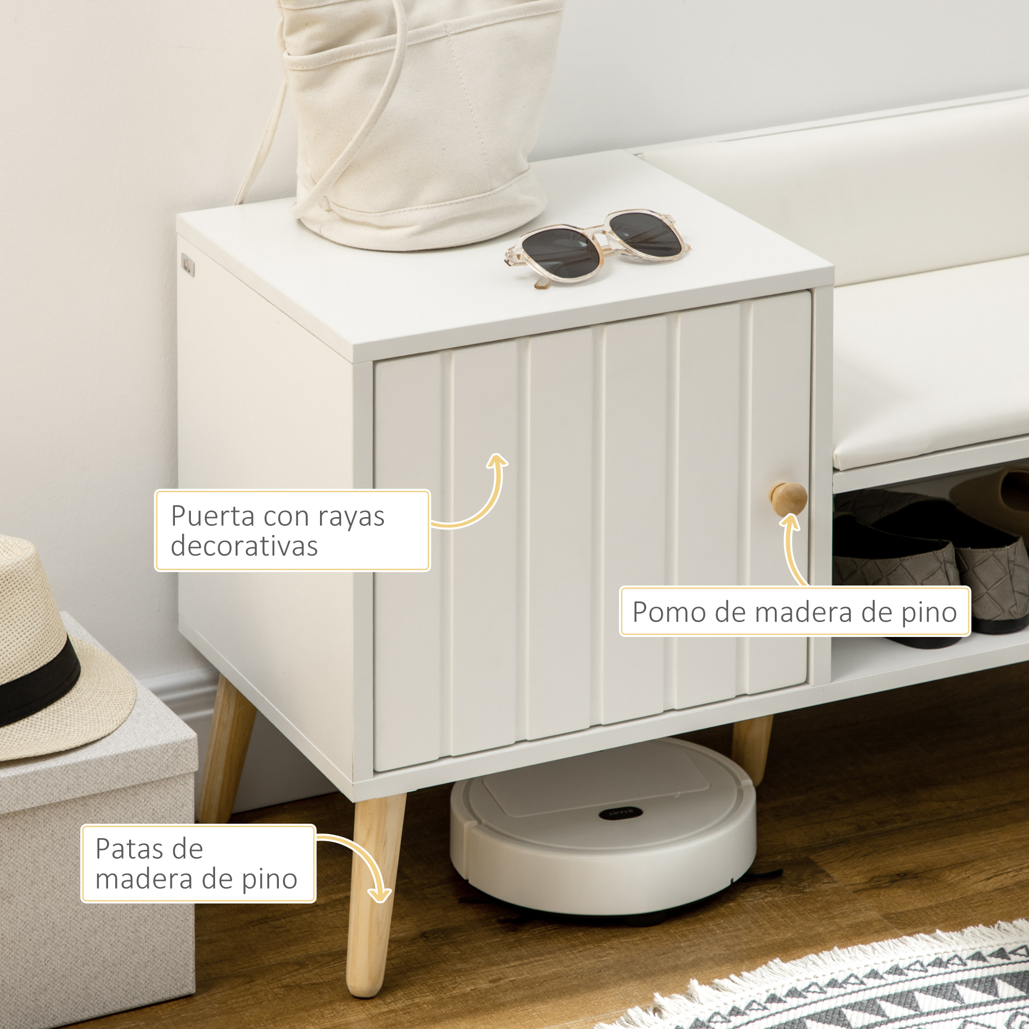 Un mueble de almacenamiento blanco con puertas de madera, gafas de sol, bolso y aspirador.