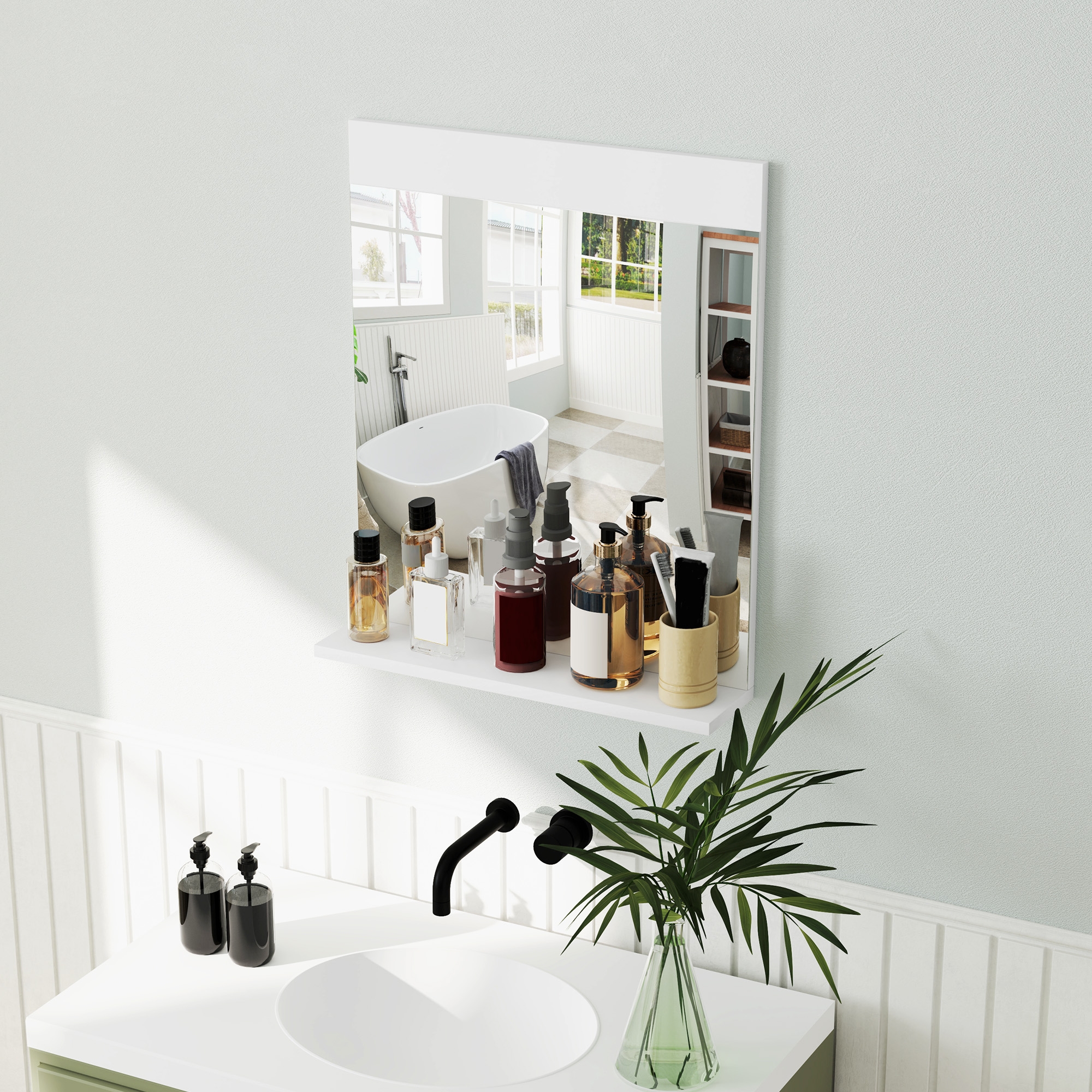 Un baño con lavabo, grifo, espejo y artículos de exhibición.