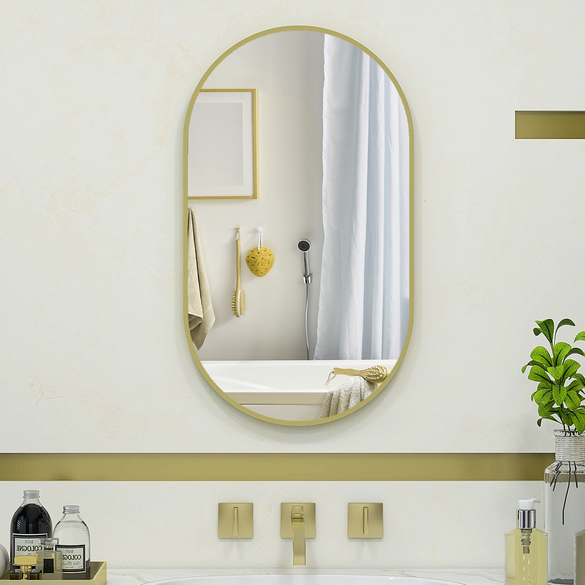 Baño con espejo ovalado, bañera, plantas y dispensadores de jabón.