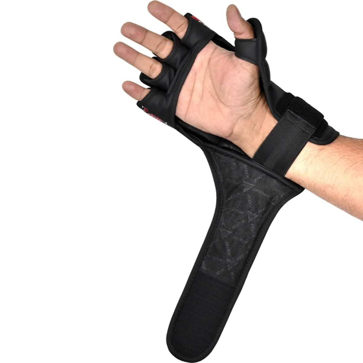 A person wearing a black weightlifting glove with finger cutouts and wrist support.