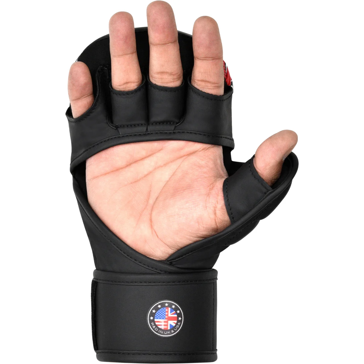 Hand in black weightlifting glove, thumb and fingers exposed.