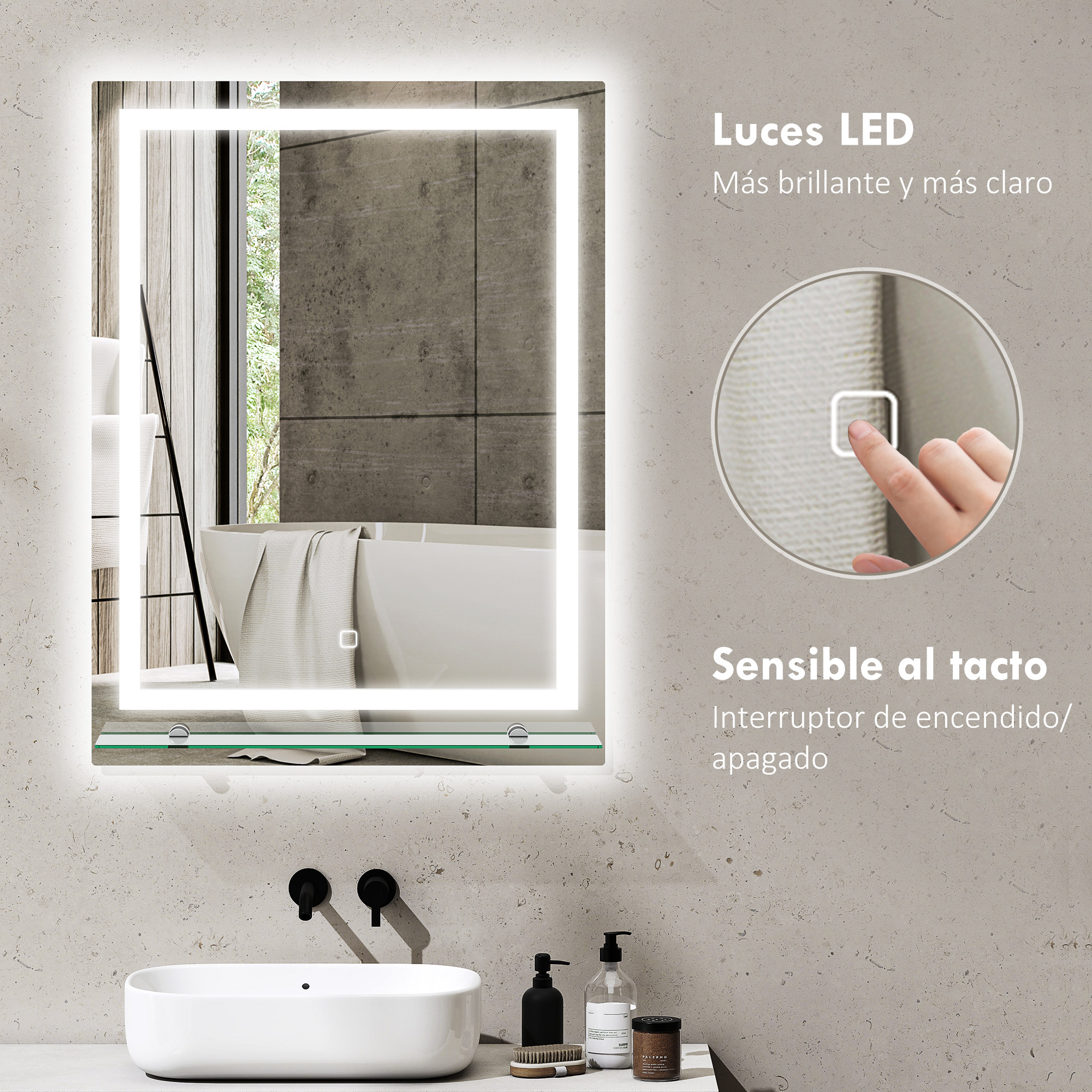 Un espejo retroiluminado sobre un lavabo con grifos. Un dedo toca el espejo.