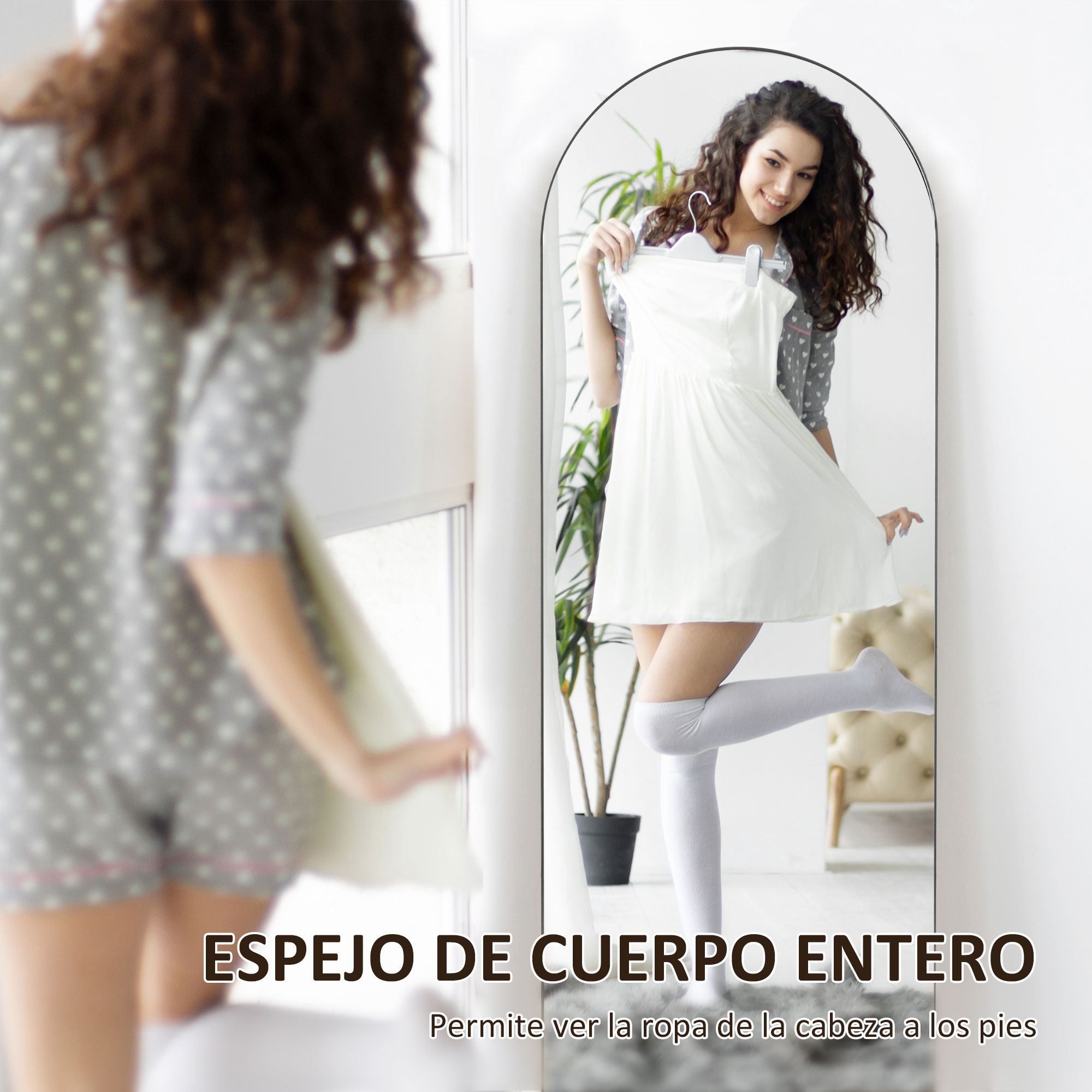Una mujer se prueba un vestido blanco, mirándose en un espejo y sonriendo.