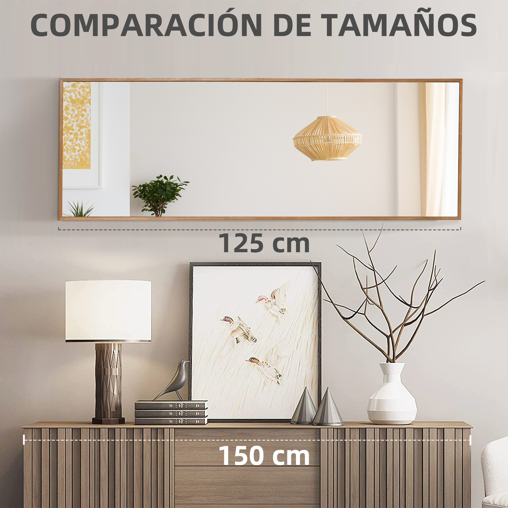 Un espejo largo sobre una cómoda con lámpara, cuadros y jarrón.