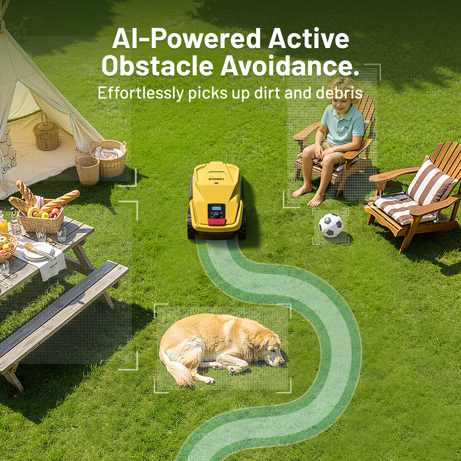 Żółty robot koszący omija psa na trawie, obok stołu piknikowego i dwóch krzeseł.