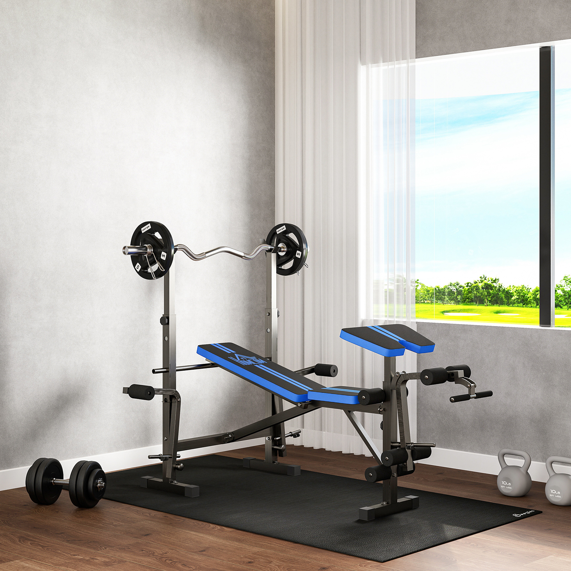 Gimnasio en casa con banco, barra, mancuernas y pesas rusas junto a ventana.