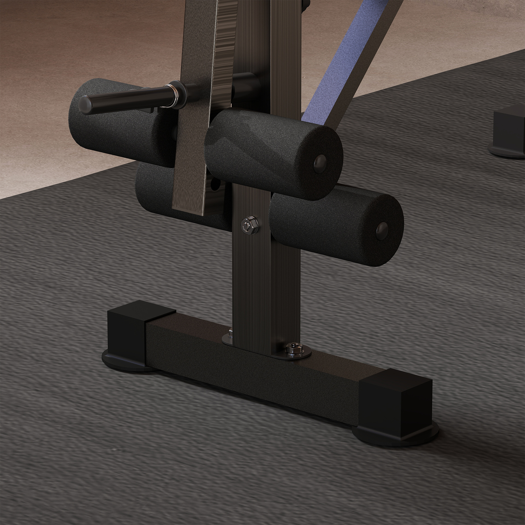 Primer plano de un rodillo acolchado negro en una máquina de gimnasio.