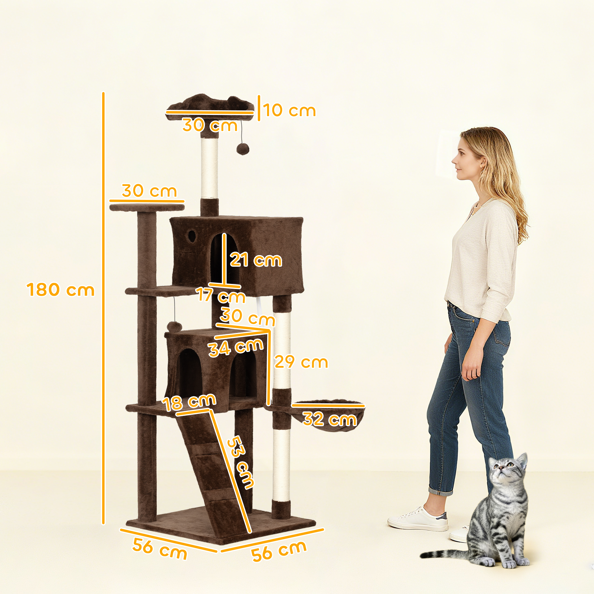 Un árbol rascador marrón de varios niveles con dimensiones. Una mujer y un gato están cerca.