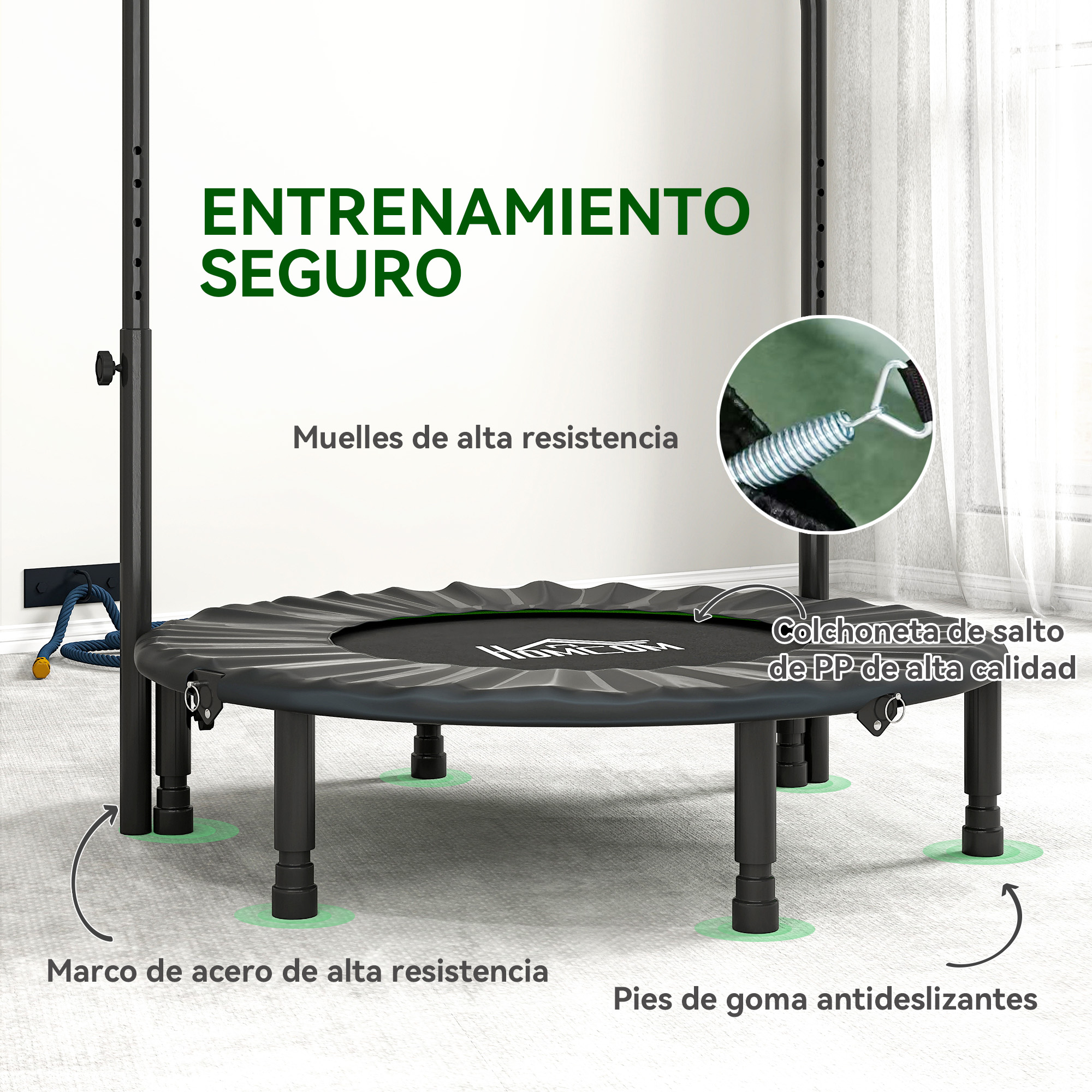 Una cama elástica negra con marco metálico y pies de goma está sobre una alfombra.