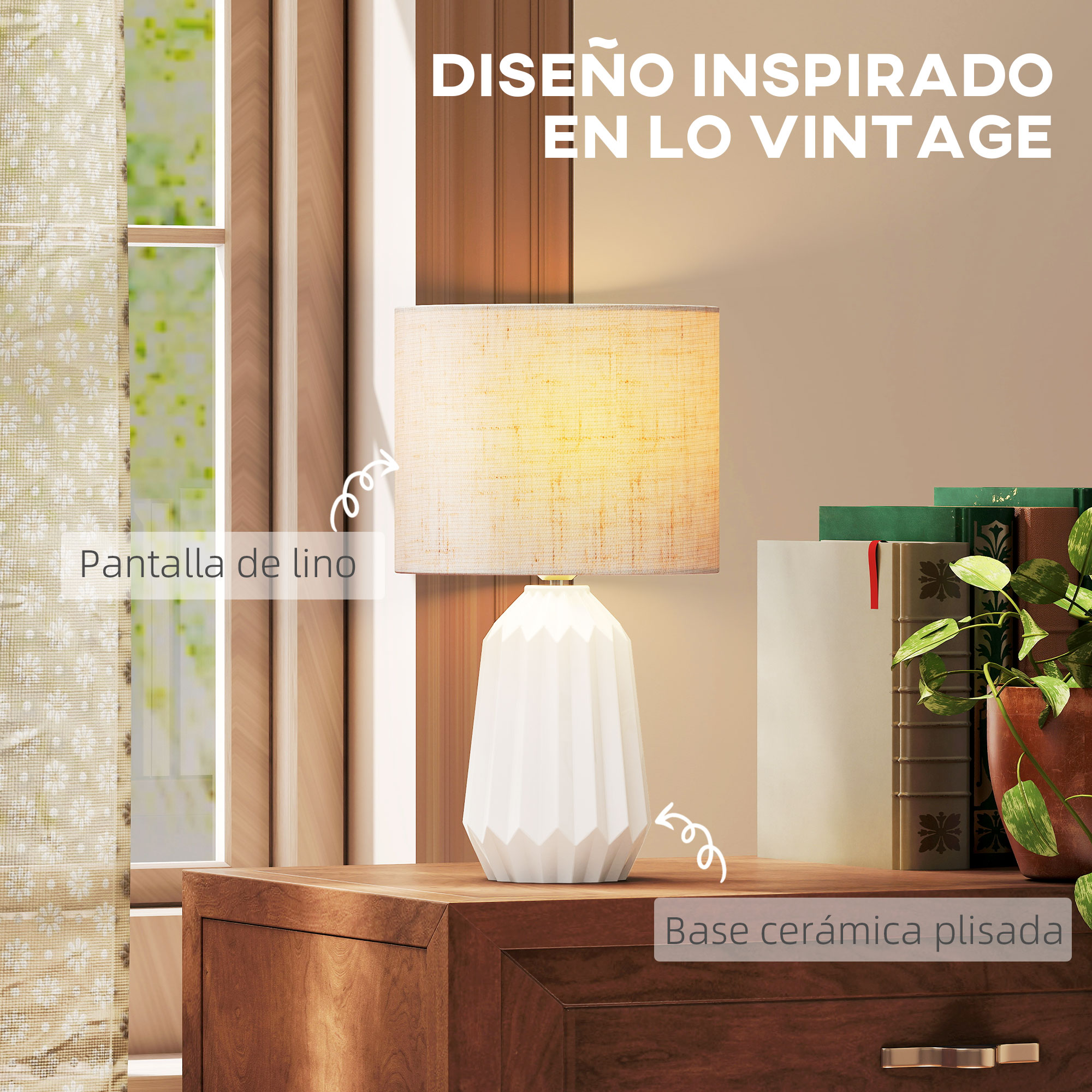 Una mesita de noche con una lámpara blanca, libros y una planta.