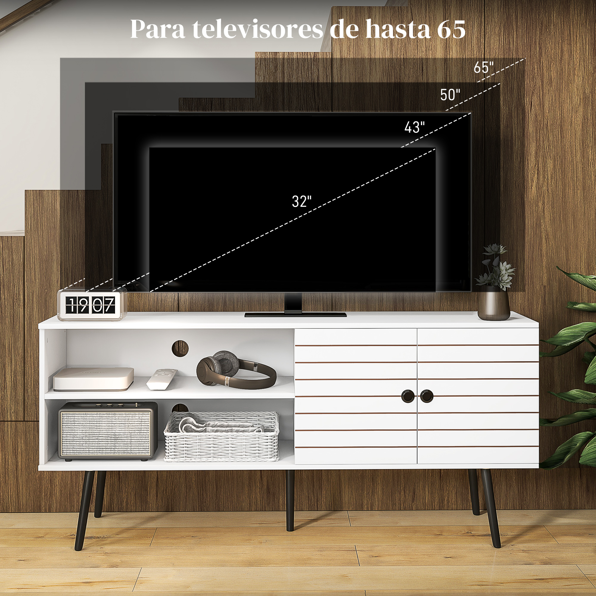 Mueble de TV blanco moderno con TV negra y objetos decorativos.