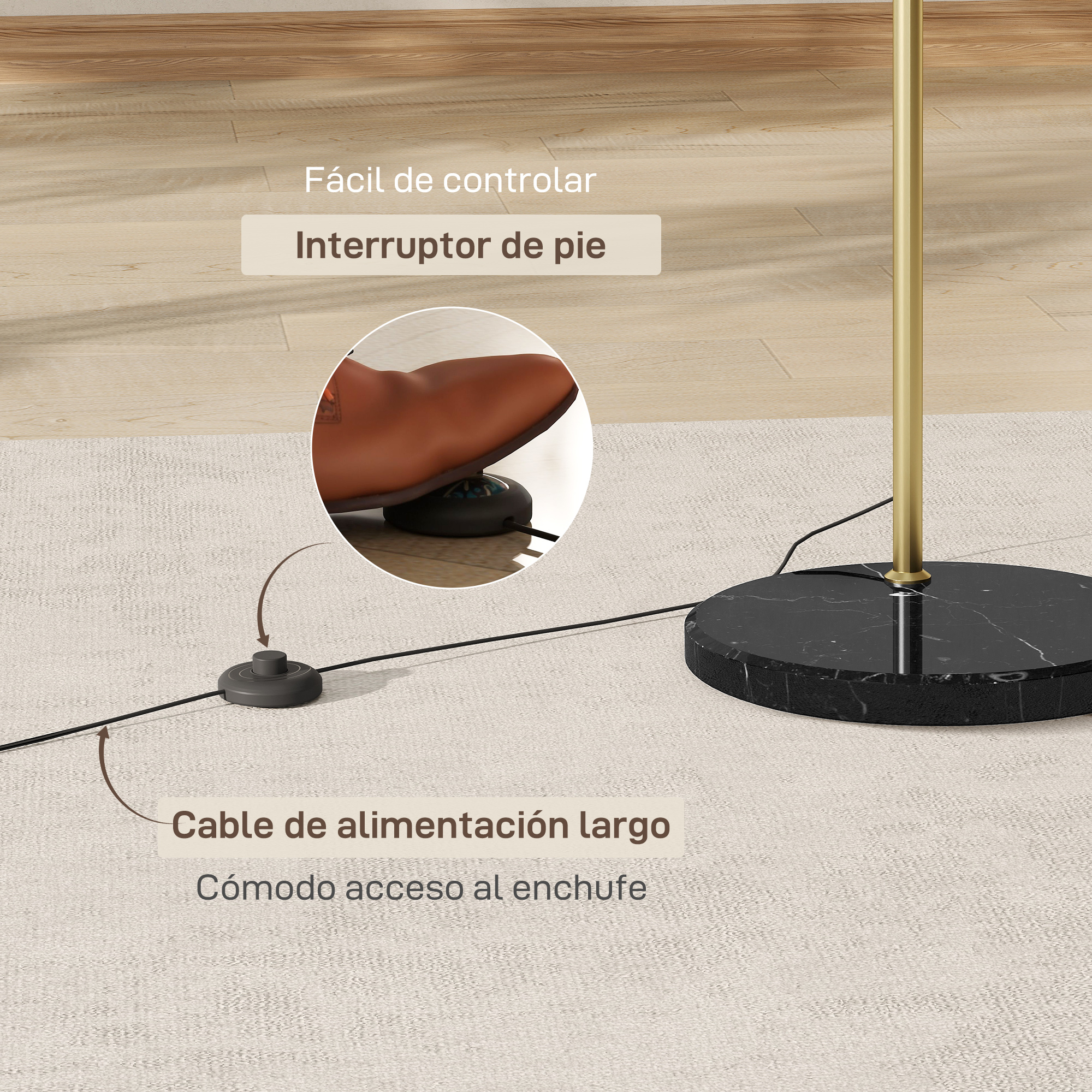 Un interruptor de pie con cable largo para lámpara de pie con base de mármol negro.