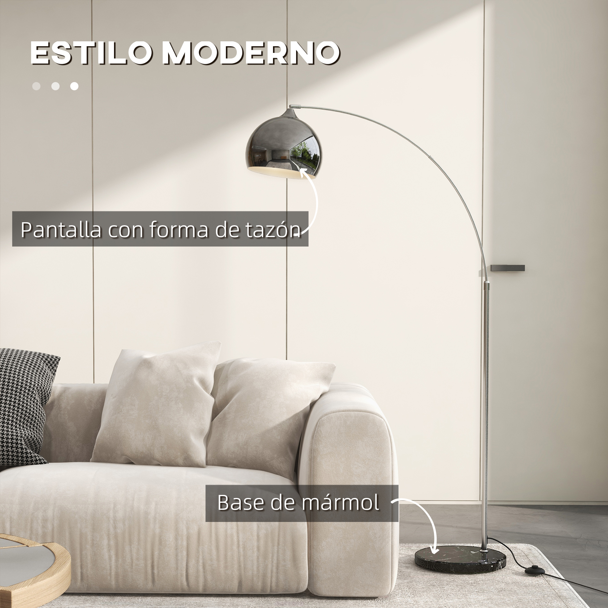 Espacio de estar moderno con sofá beige, pantalla de lámpara arqueada y base de mármol.